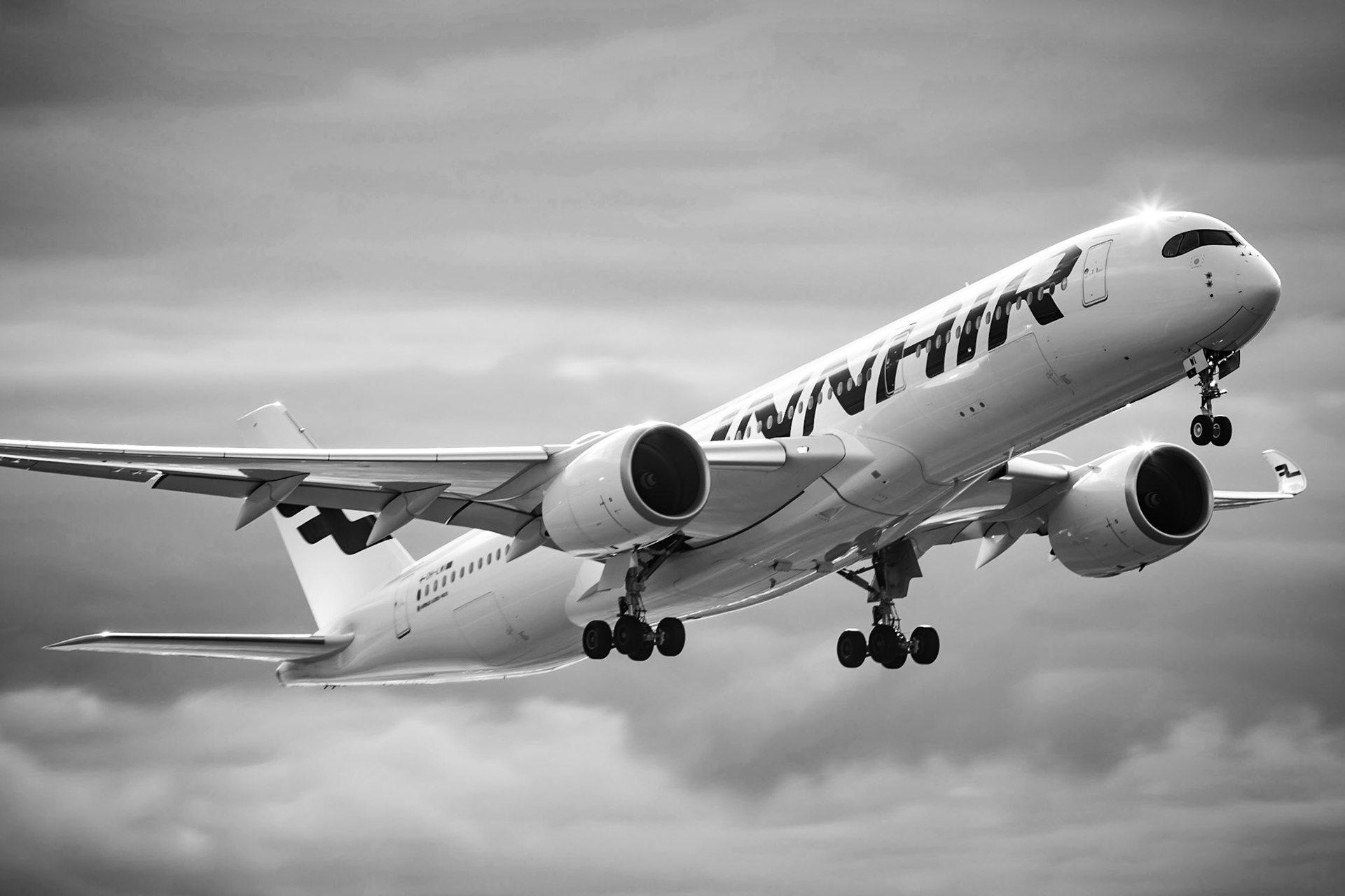 It been pretty dull weather lately here @helsinkiairport, so not much color information in the #scenery. #blackandwhite will do. @Finnair Airbus A350 climbing up runway 04R