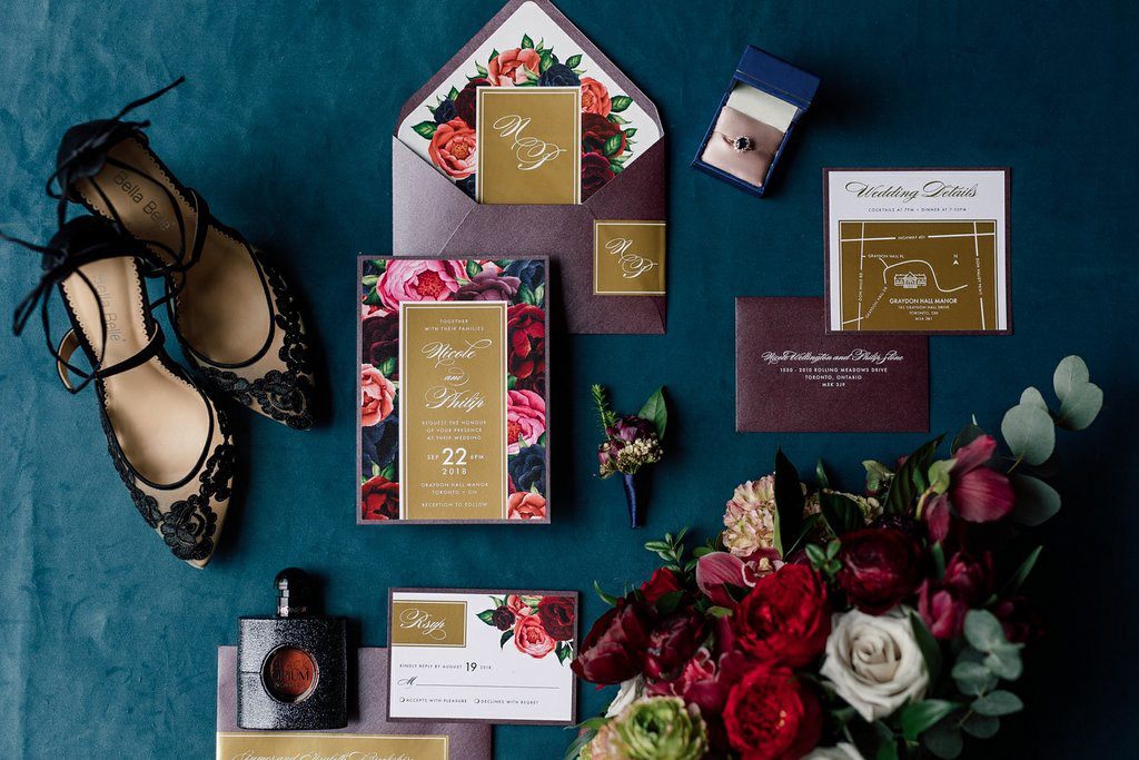 The bold jewel-toned florals in this suite are balanced by flooded areas of shimmering gold foil