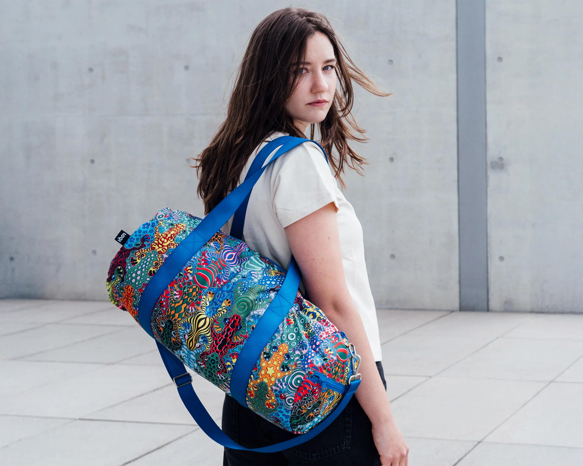 Sam Wilde × LOQI capsule tote bag in bold graphic pattern printed on 100% recycled fabric.