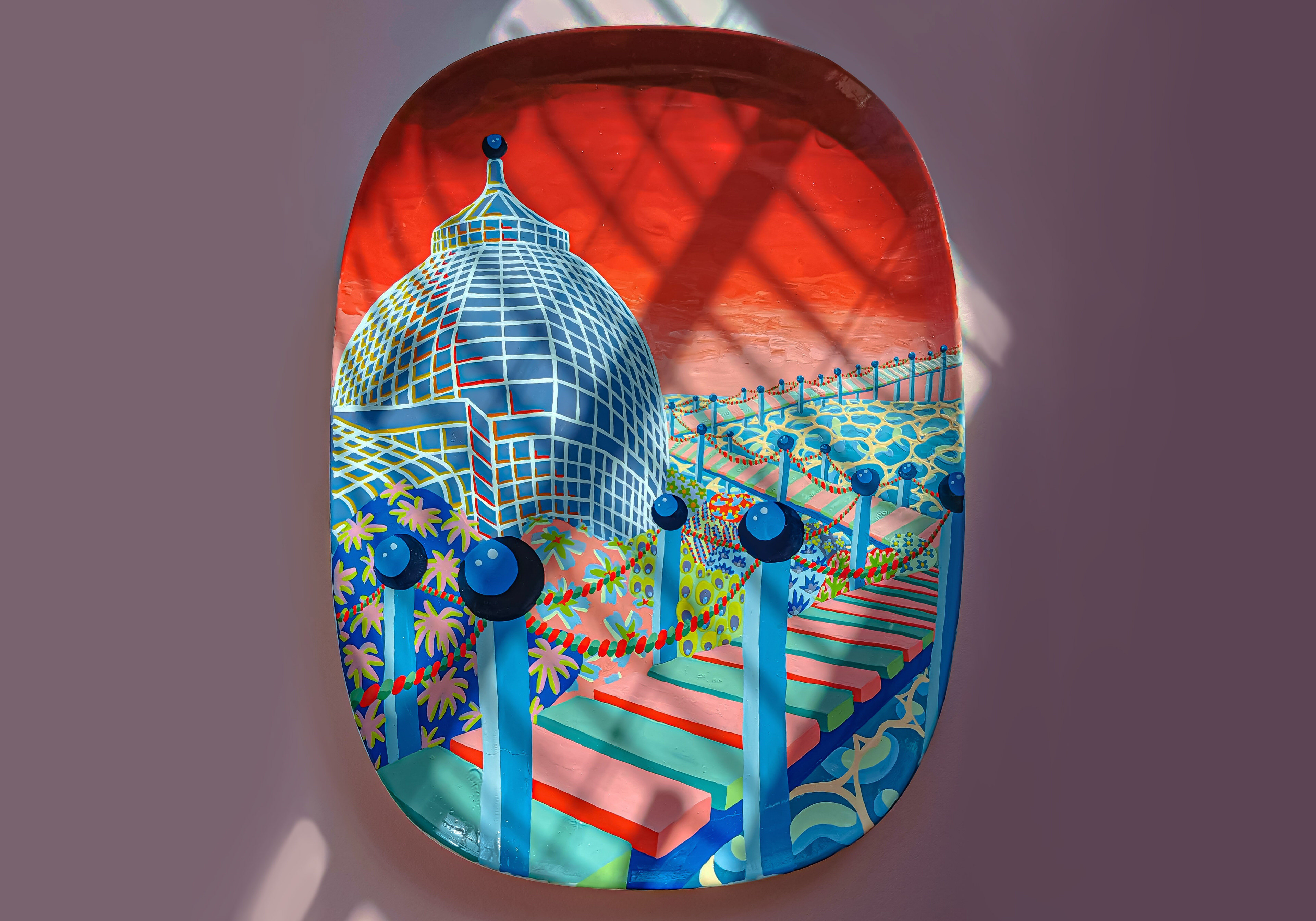 Hand-painted ceramic plate showing a red sky and wooden multi-colour walkway over an oil spill.