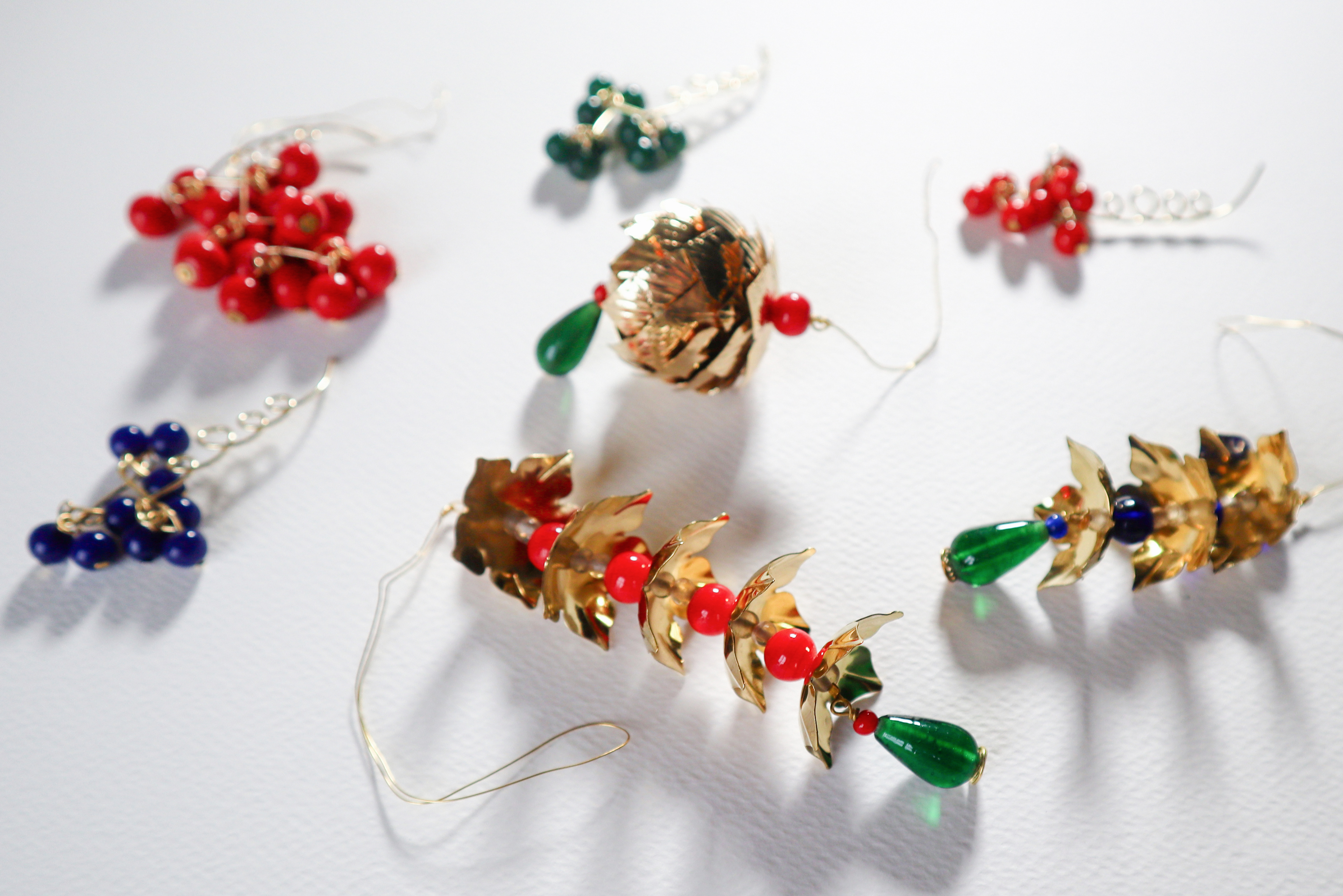 Ornate brass and glass poison Christmas tree ornaments for Swedish brand Svenskt Tenn.