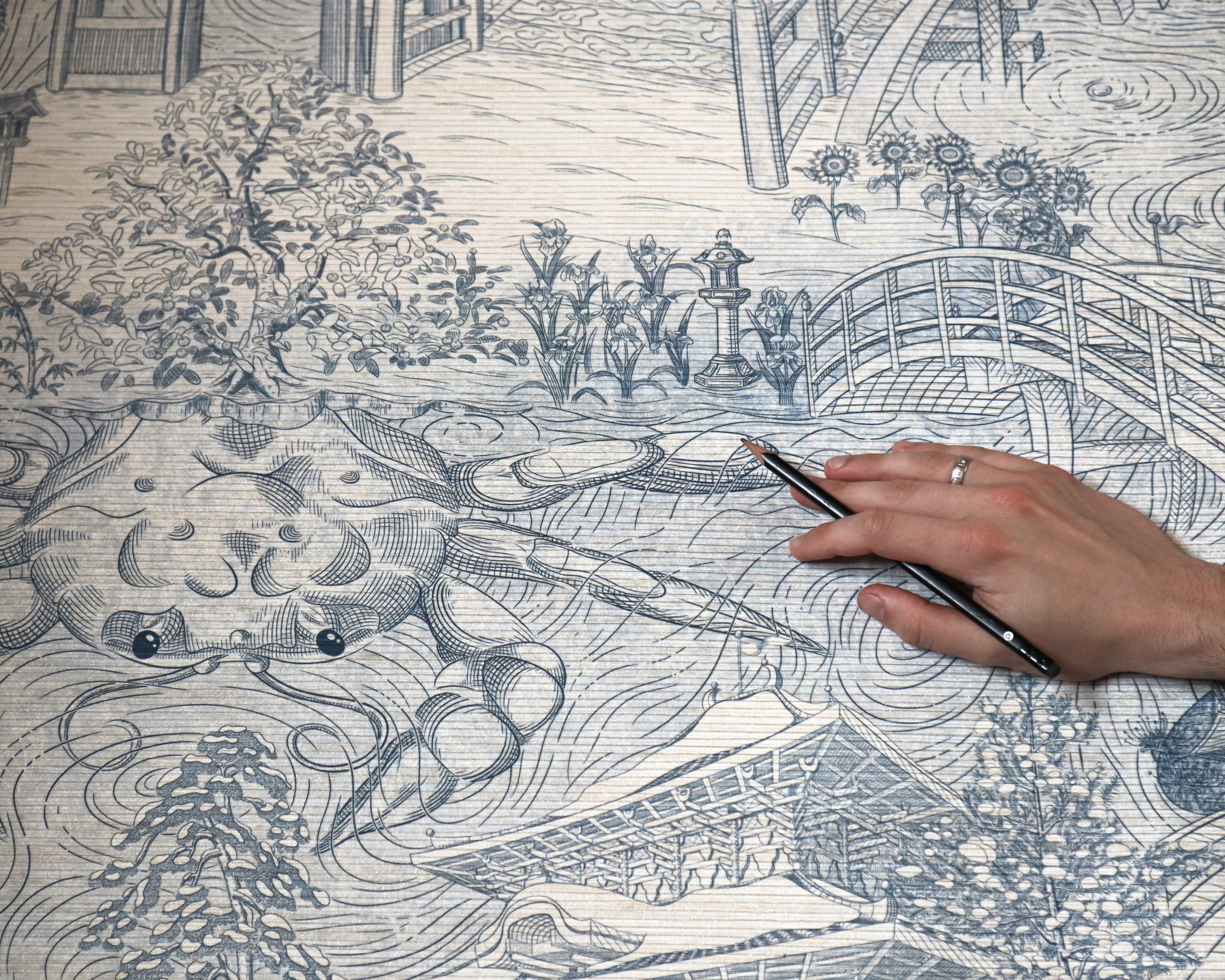 Close-up image of an illustrated samurai crab printed onto bamboo wallpaper.