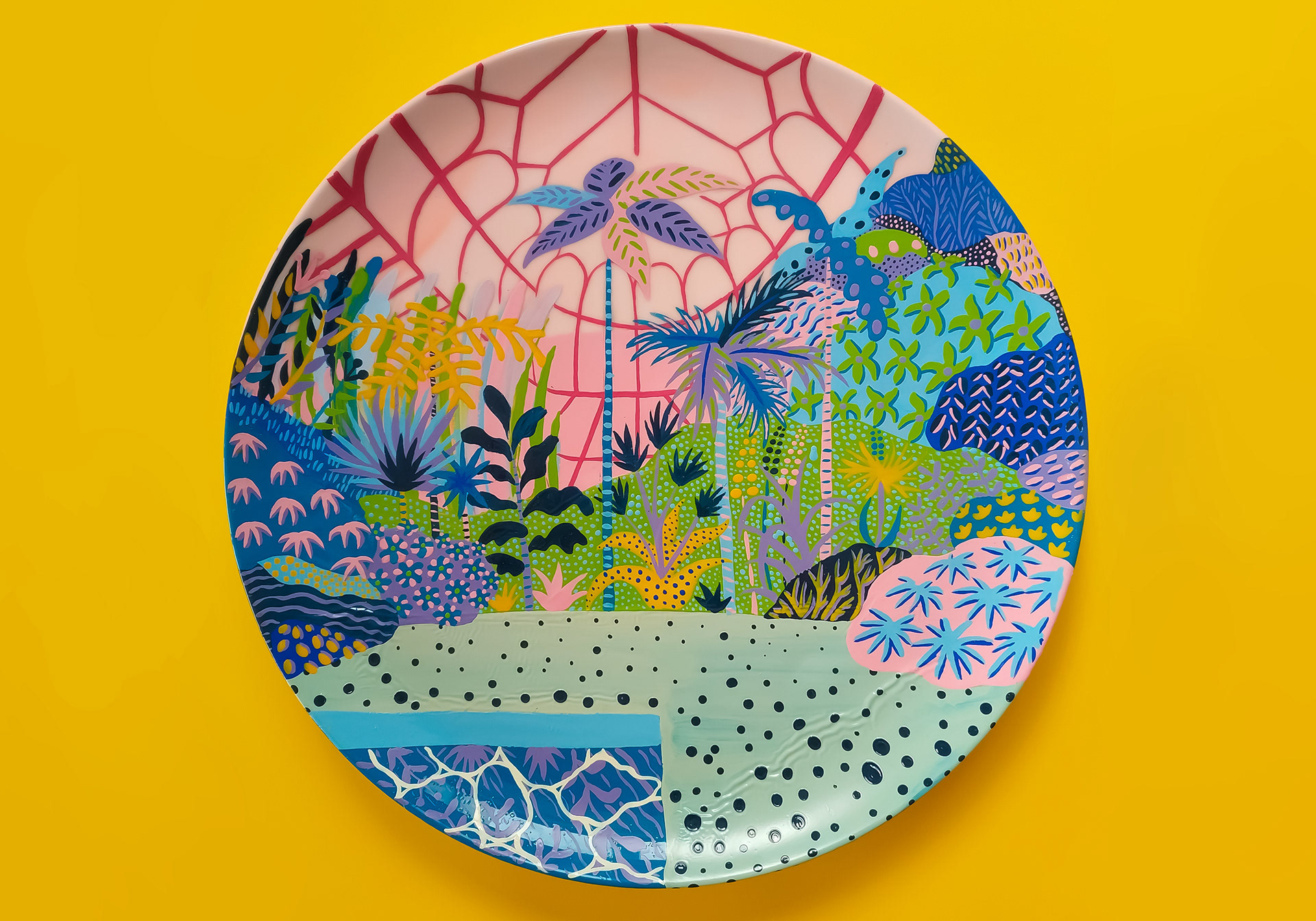 Hand-painted ceramic of a pink greenhouse scene filled with colourful plant life.