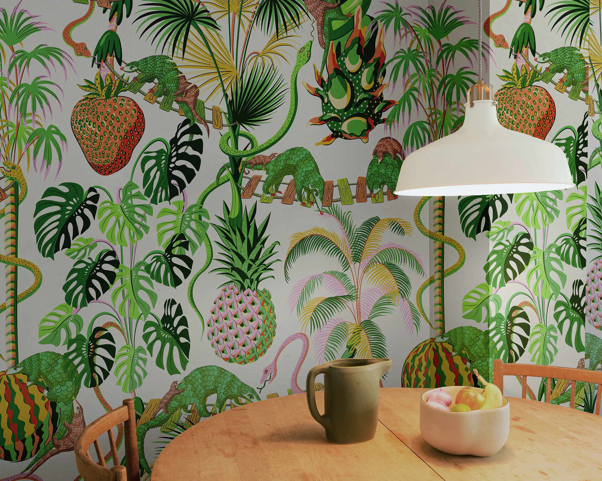 Precarious Pangolins wallpaper depicting a jungle scene on the walls of a dining room.