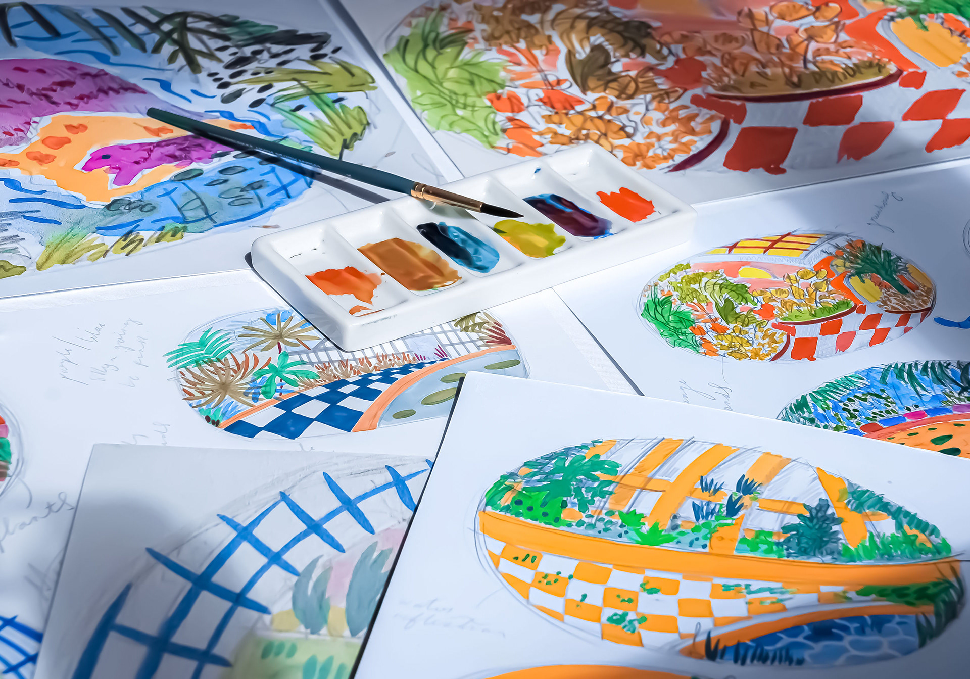 Photograph showing work-in-progress drawings and paintings for the Glasshouse ceramics.