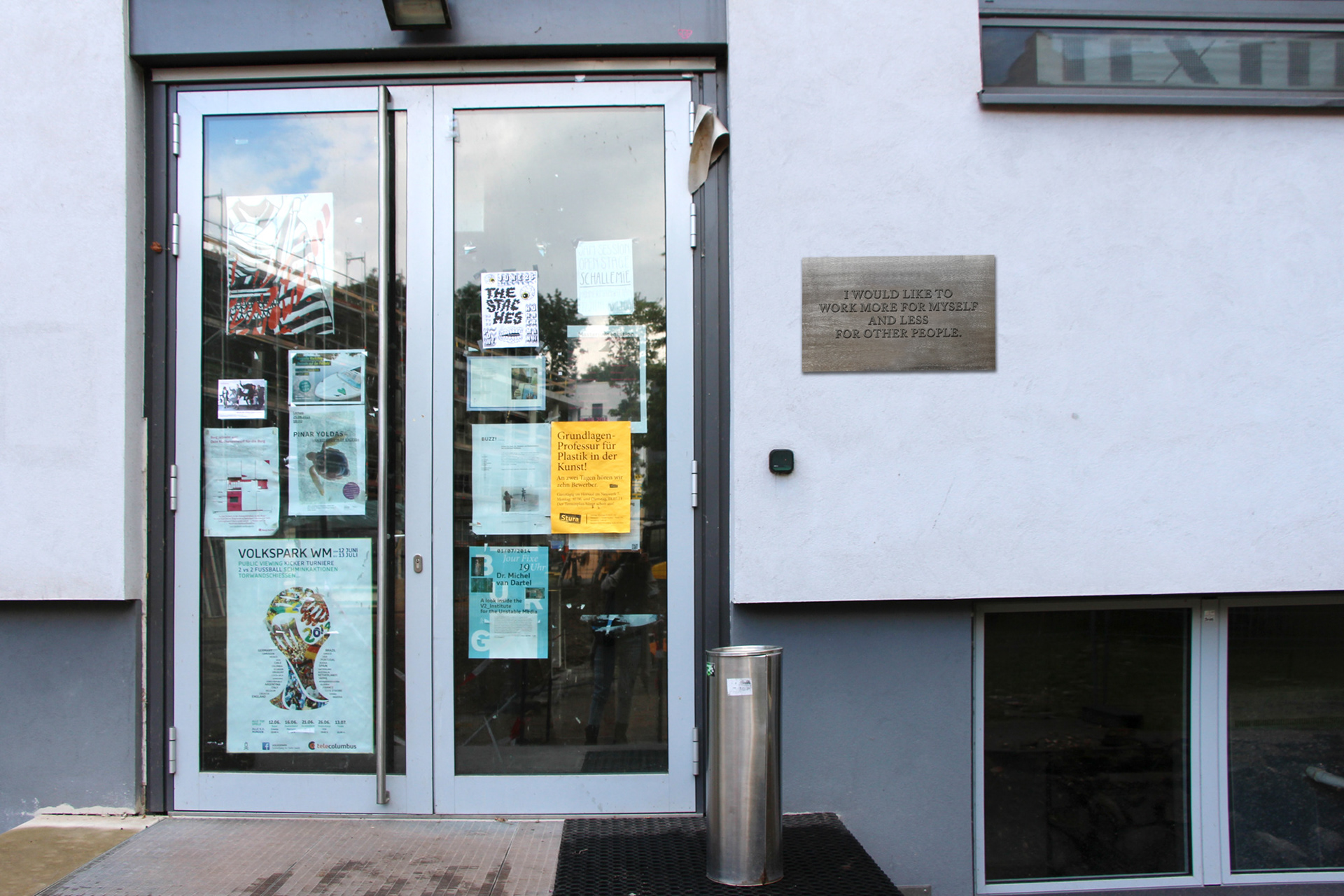 Plaque at the door of the Fashion Design Faculty: "I would like to work more for myself and less for other people"" statement by Malte Kaune