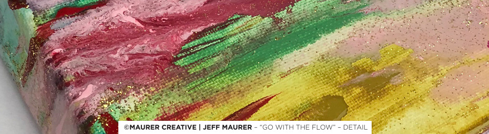 The paint flows from and around the edges of the canvas, going with the flow of where it wants to move.