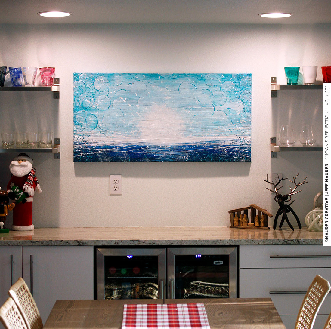 Moon's Reflection, a custom commissioned painting for a private buyer in the Northeast US was created as a gift from an uncle to his 1-year old nephew. The painting is a visual interpretation of the name of the boy, Jalendu, which translates to mean "Moon over Water". This meaning led to a use of blues and an abstract representation of a horizon line in the ocean with the moon rising over the water, casting light among the darkness.