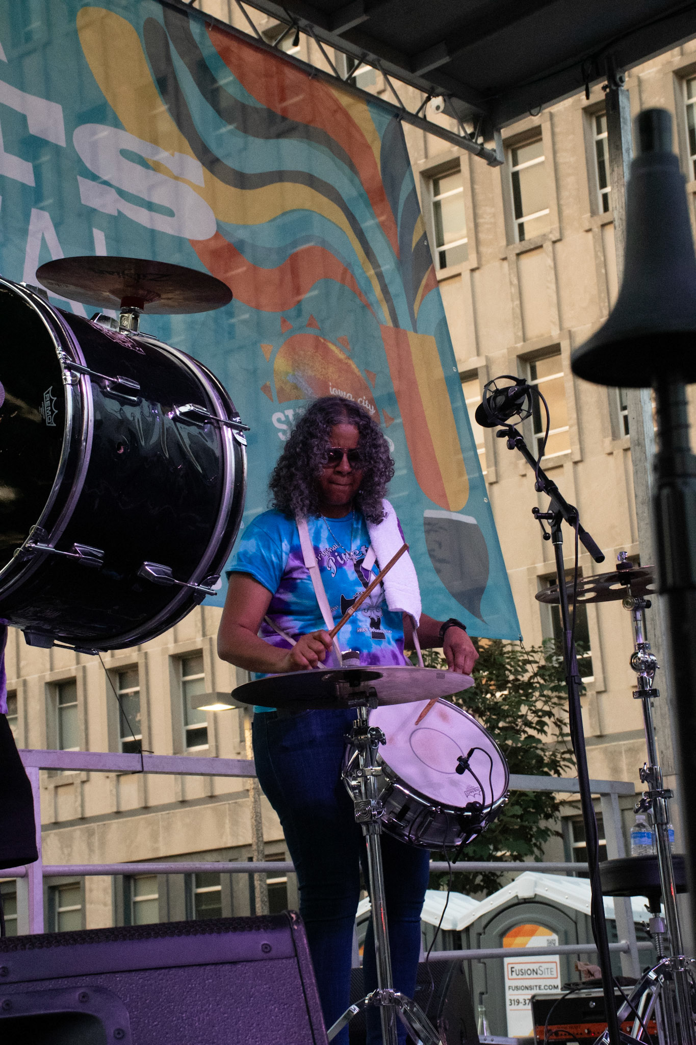 IOWA CITY, IOWA – JUNE 6, 2025: Christie Jourdan holds steady on snare drum, laying down crisp, syncopated rhythms that shaped the heartbeat of The Original Pinettes Brass Band. Her sharp playing added fire to the band’s vibrant street parade sound.