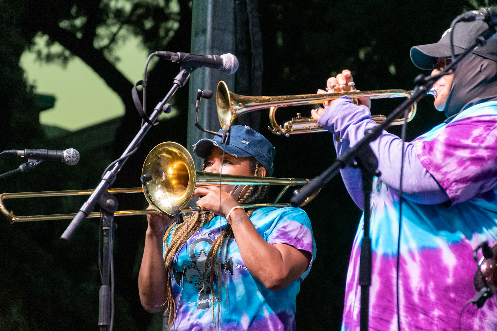 IOWA CITY, IOWA – JUNE 6, 2025: Trombonist Dionne Harrison and trumpet player Careese Williams of The Original Pinettes Brass Band play in sync during a vibrant set at the Iowa Arts Festival. Their polished horn lines added punch and power to the band’s unmistakable brass sound.