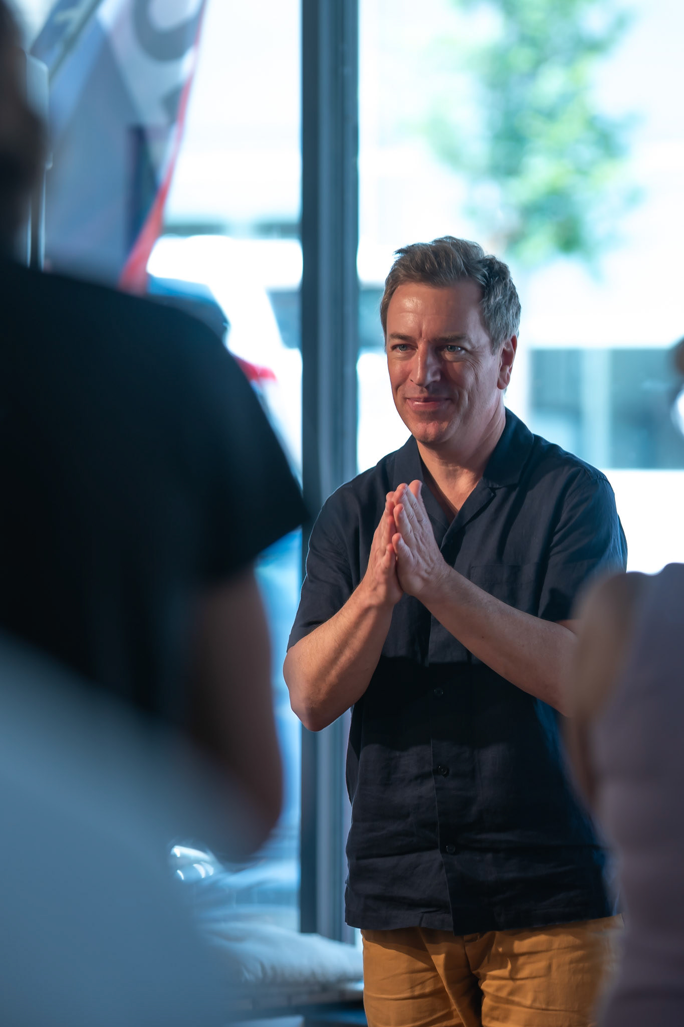 Pianist Matthew Fries acknowledges a standing ovation following his solo performance at the Burlington Art Center during the Burlington Jazz Festival on July 26, 2025.