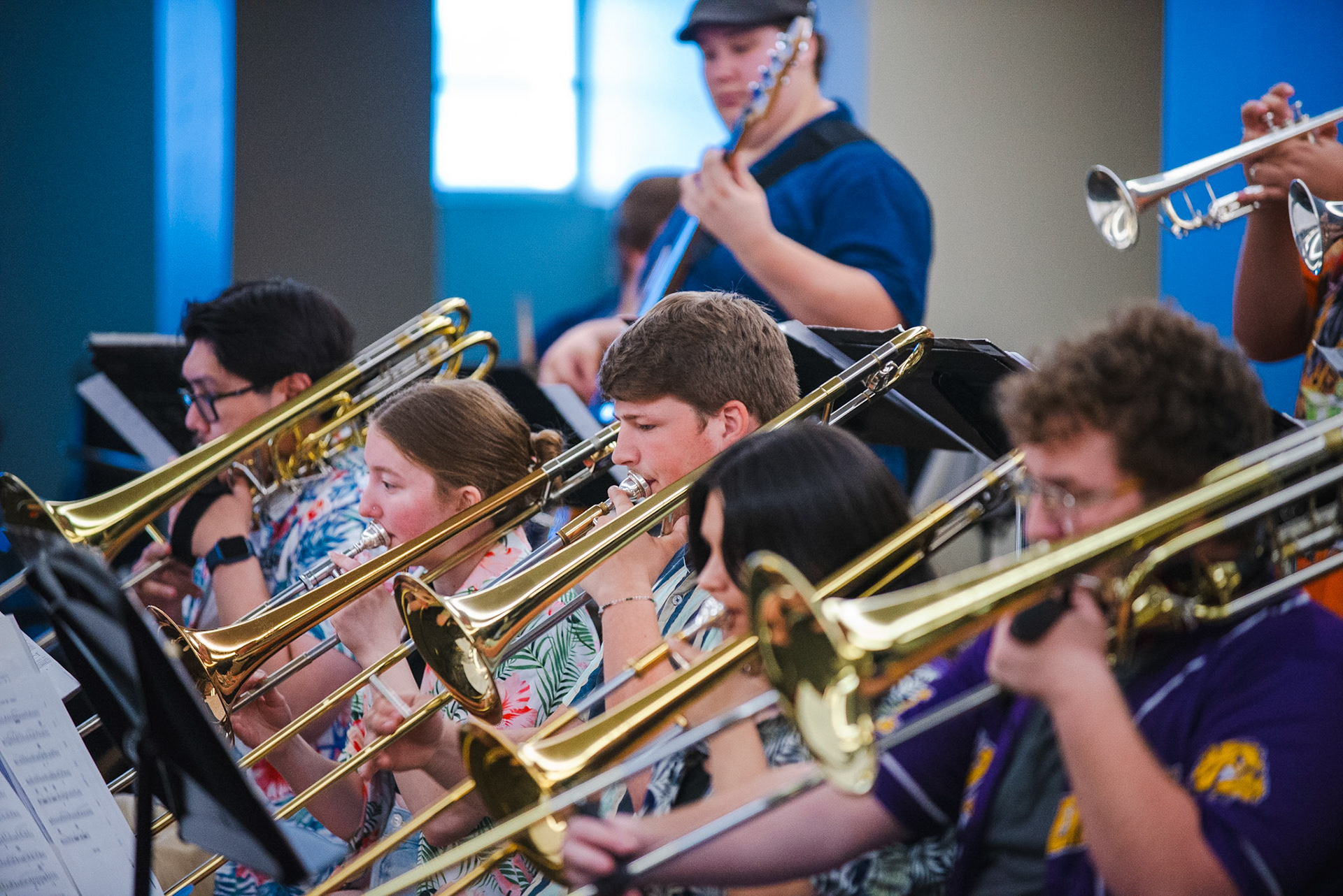 The trombone section of the Entropy Jazz Orchestra performs during their eclectic set at the Burlington Jazz Festival on July 26, 2025.