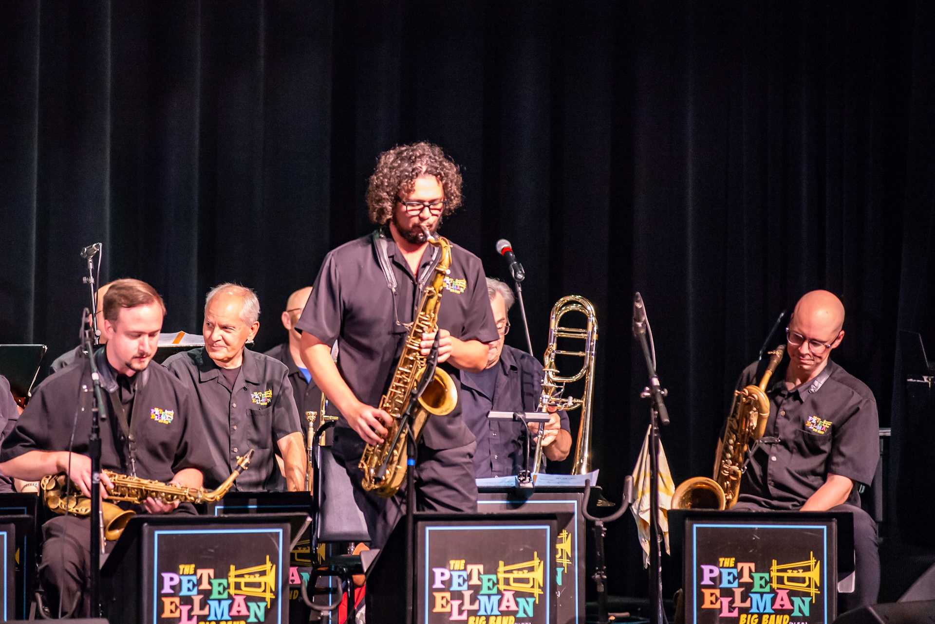 Tenor saxophonist Christian Sanchez takes the spotlight with a soulful solo during the Pete Ellman Big Band’s performance at the Burlington Jazz Festival on July 26, 2025.