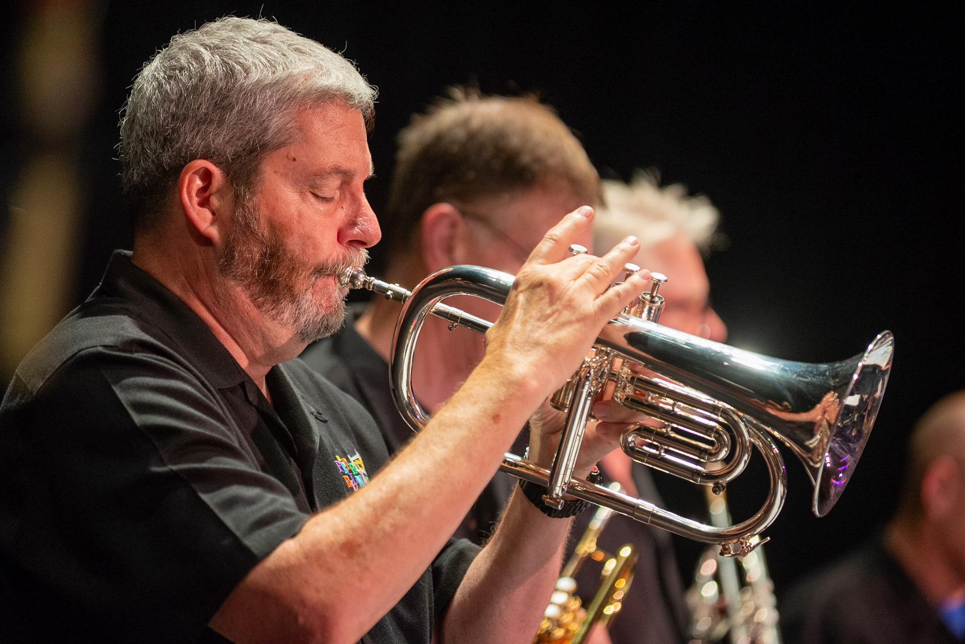 Trumpeter Dave Katz joins the Pete Ellman Big Band on flugelhorn, adding smooth tones to the ensemble’s brassy finale at the Burlington Jazz Festival on July 26, 2025.