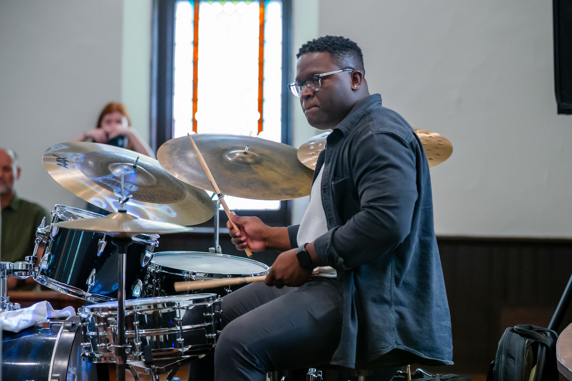 Drummer Sid Smith IV locks into a deep groove with the Elisha Organ Trio, blending precision and fire during their set at the Burlington Jazz Festival on July 26, 2025.