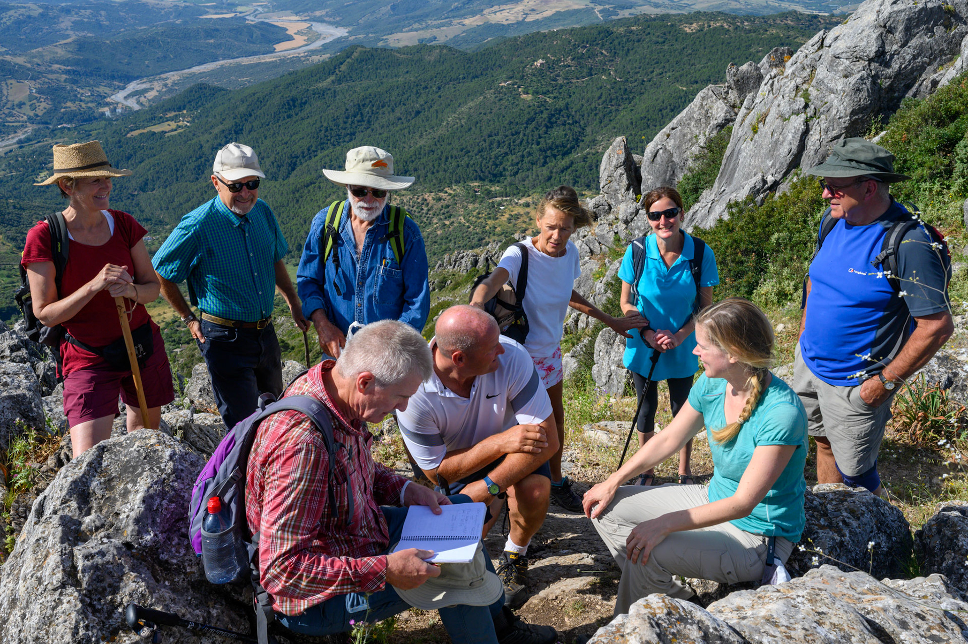 Mel fills the guest book at the summit of El Hacho
