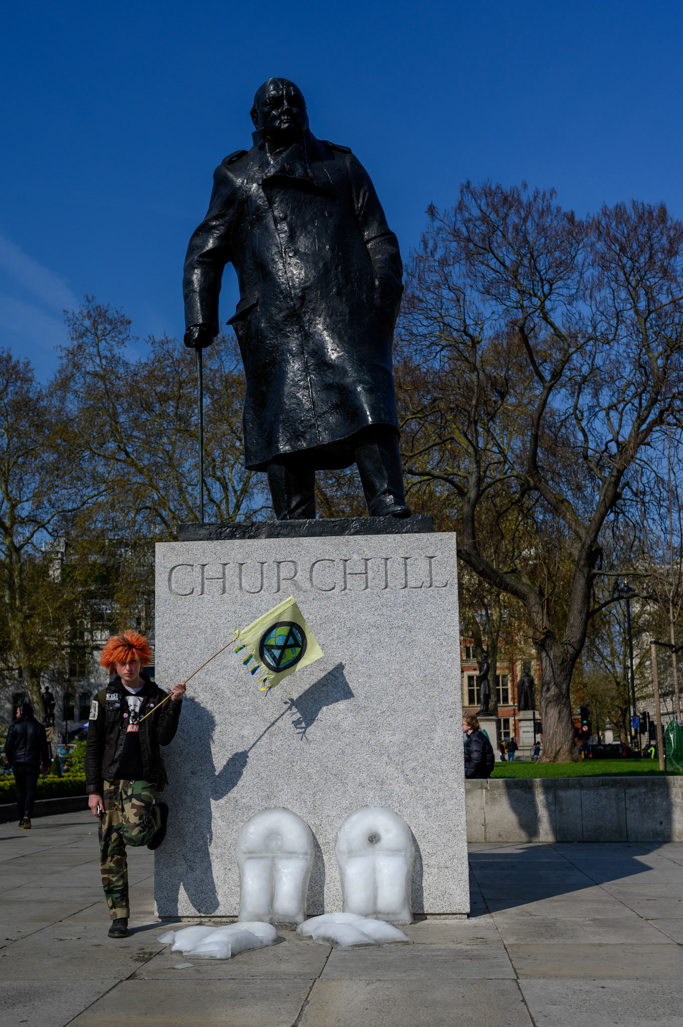 Hihjacking another photographers photo of a young protestor posing with Winston. And melting ice life jackets. Ice floats, I suppose, until it melts.
