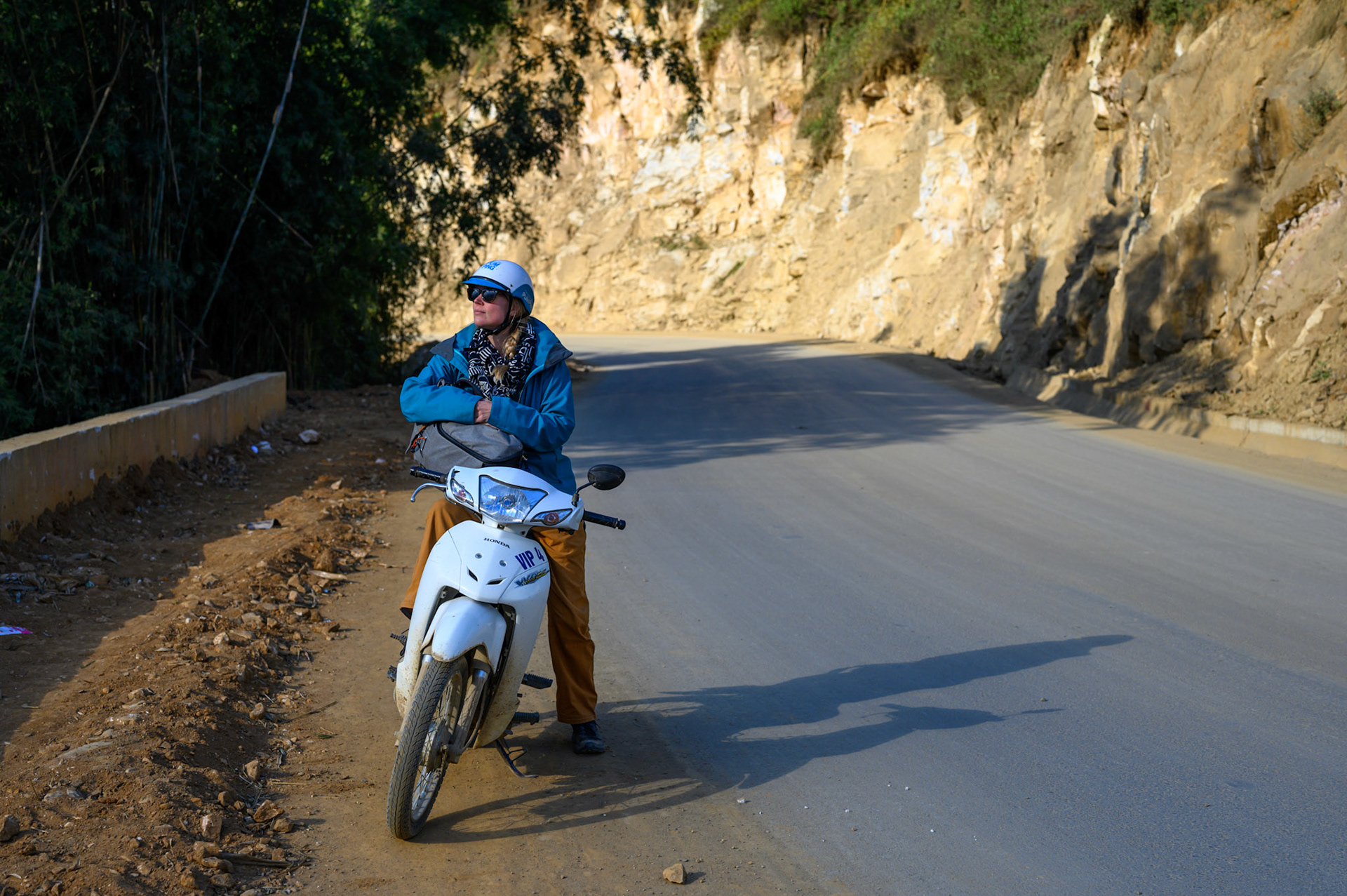 Sheryl watching they valley from our hired scooted.