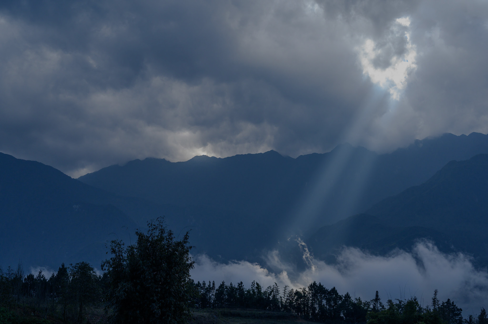 Sun rays pierce to the valley