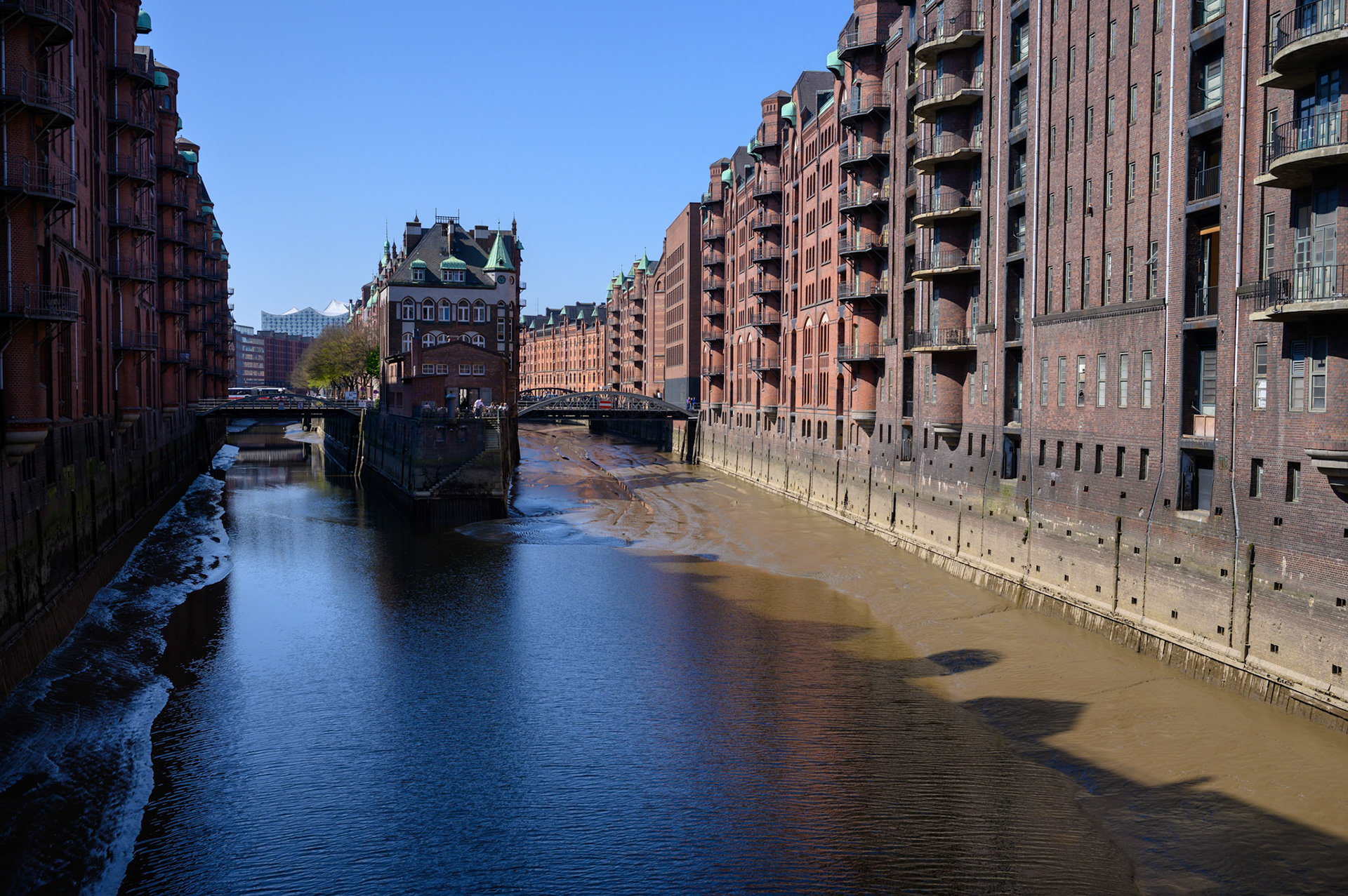 At low tide the Hamburg canals expose their muddy banks.