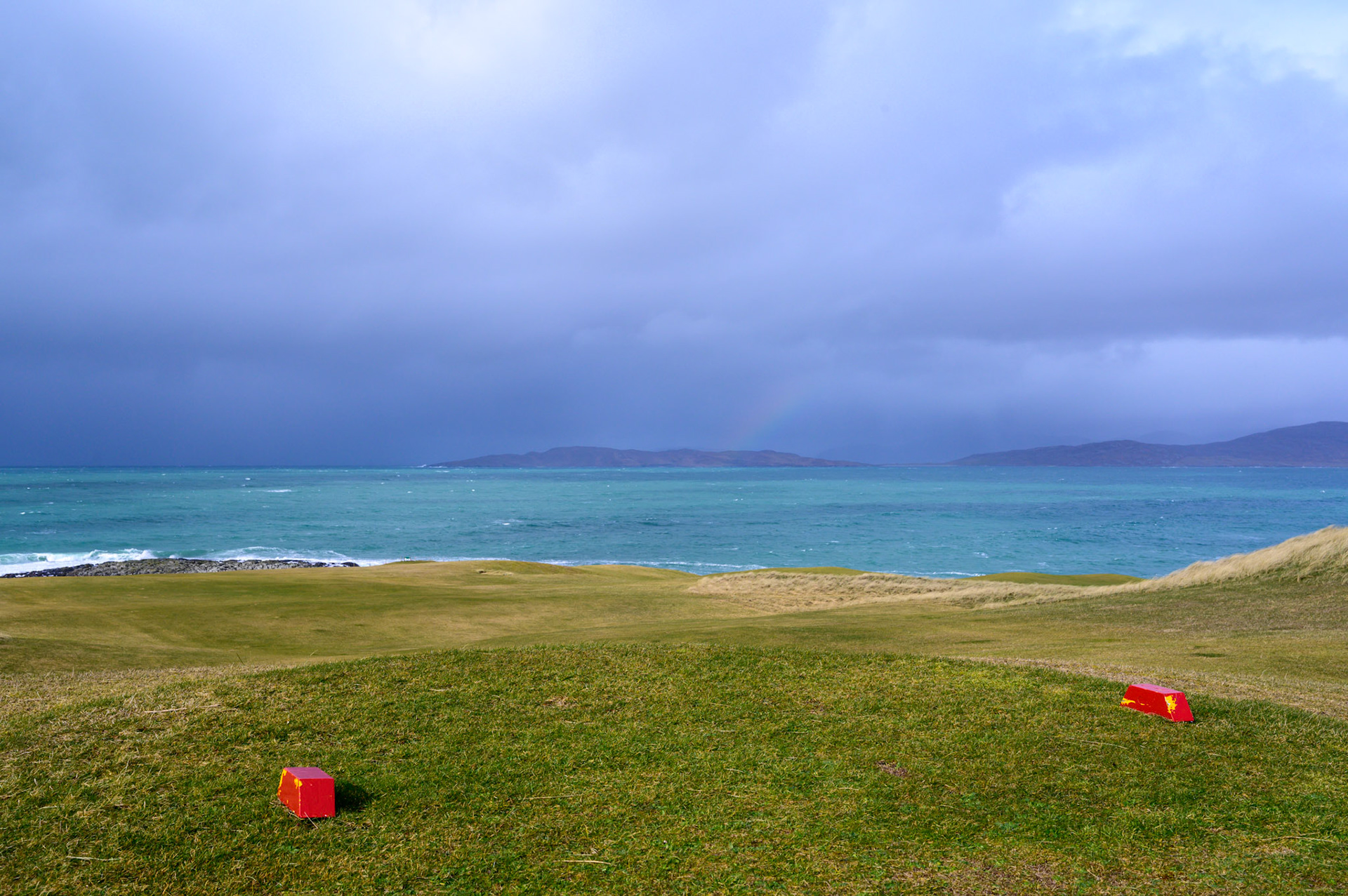 The Harris Golf Club. The weather alternated between chill sunshine and sleet. The whipping wind was a constant.