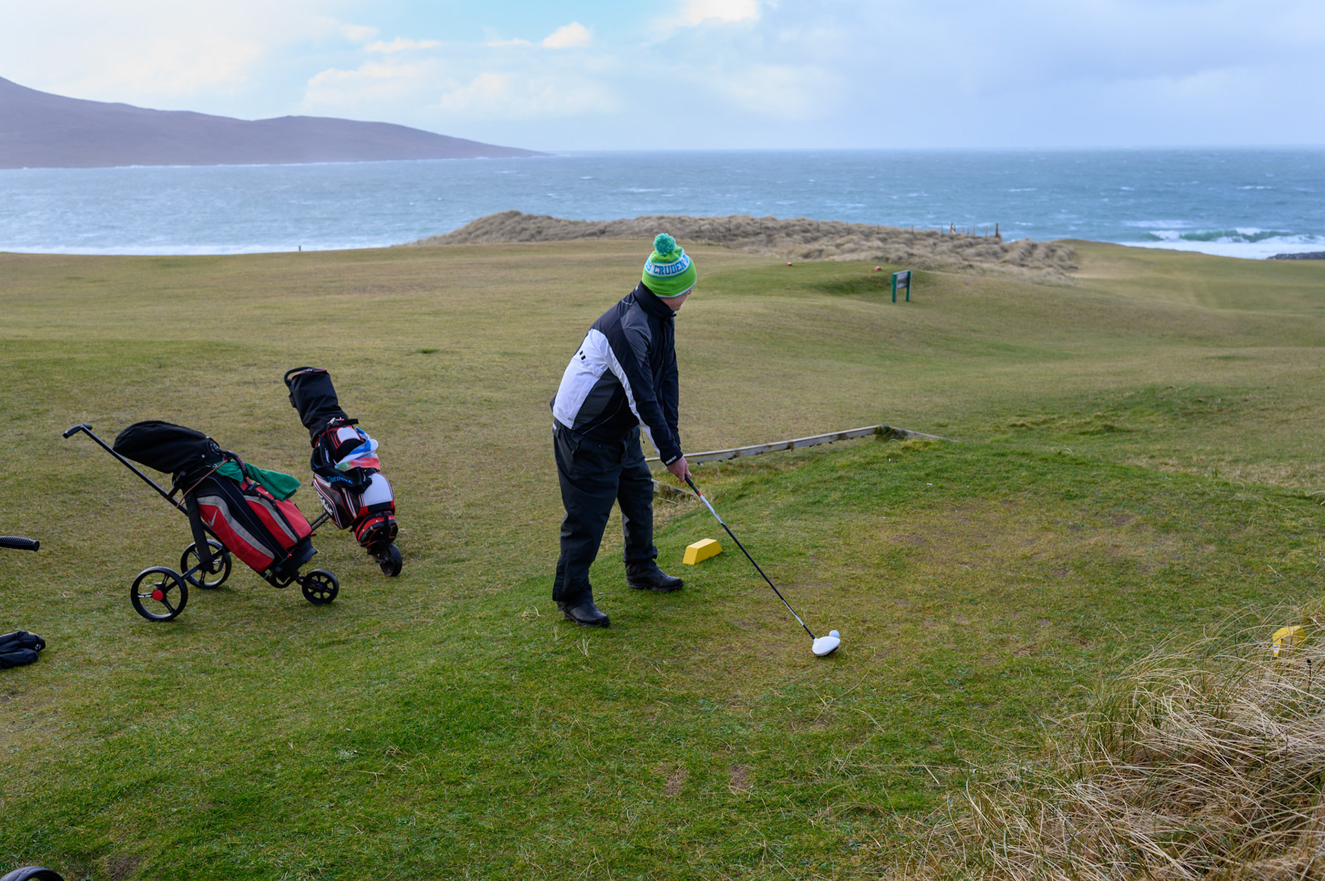 Every yeary on this day these Lewis and Harris lads play golf, whatever the weather. The Stornoway golf club was sensibly closed, but the Harris Golf Club has no such qualms about a bit of wild weather.
The first to tee off.