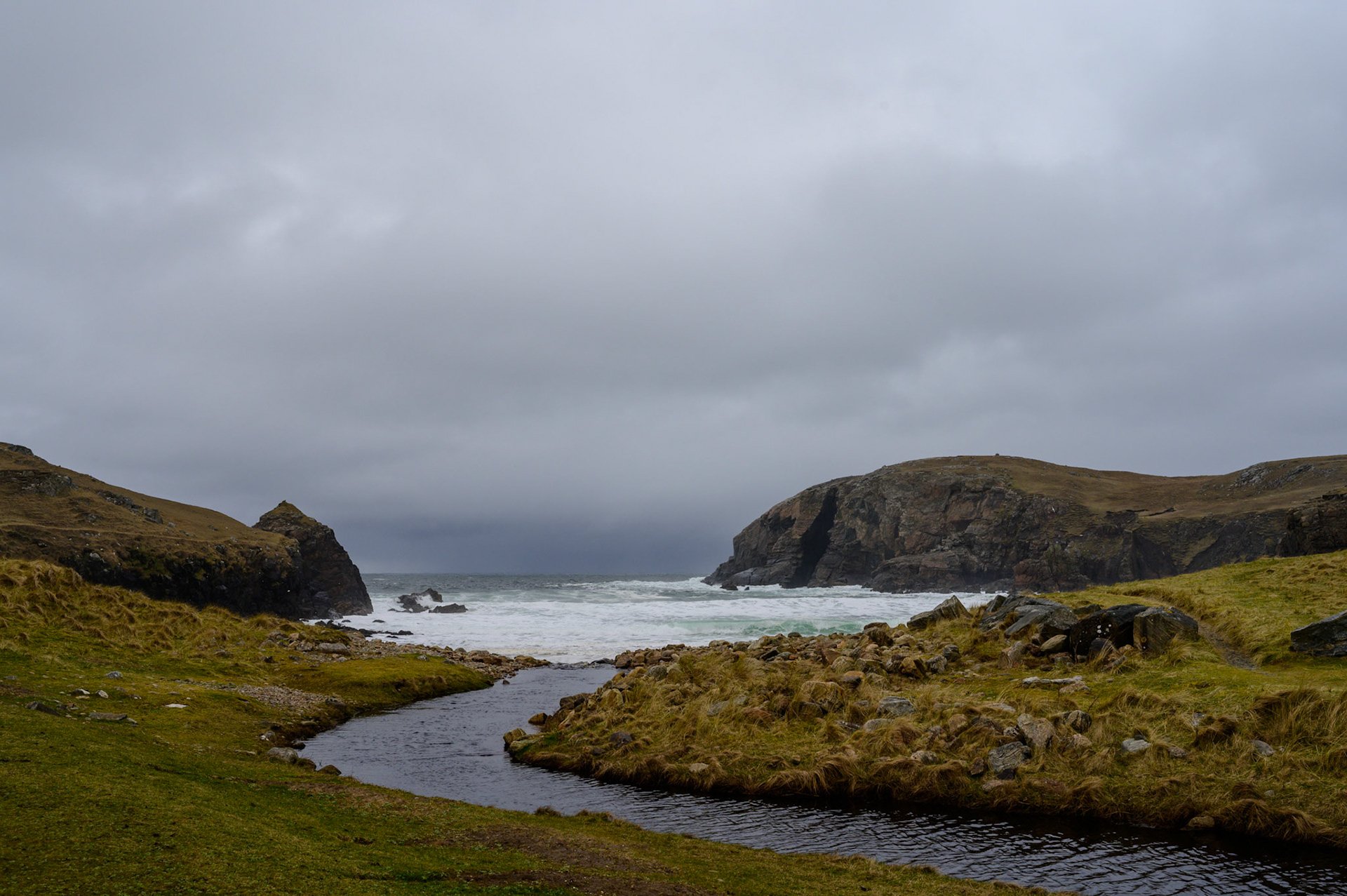 A river running into the sea at beautiful  lonely rugged Dalbeg.