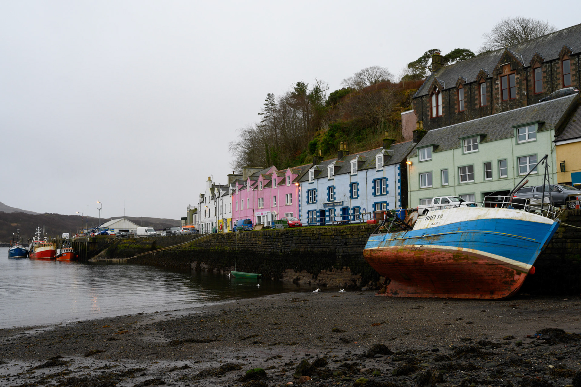 Colurful harbourside under a drab sky in Portree.