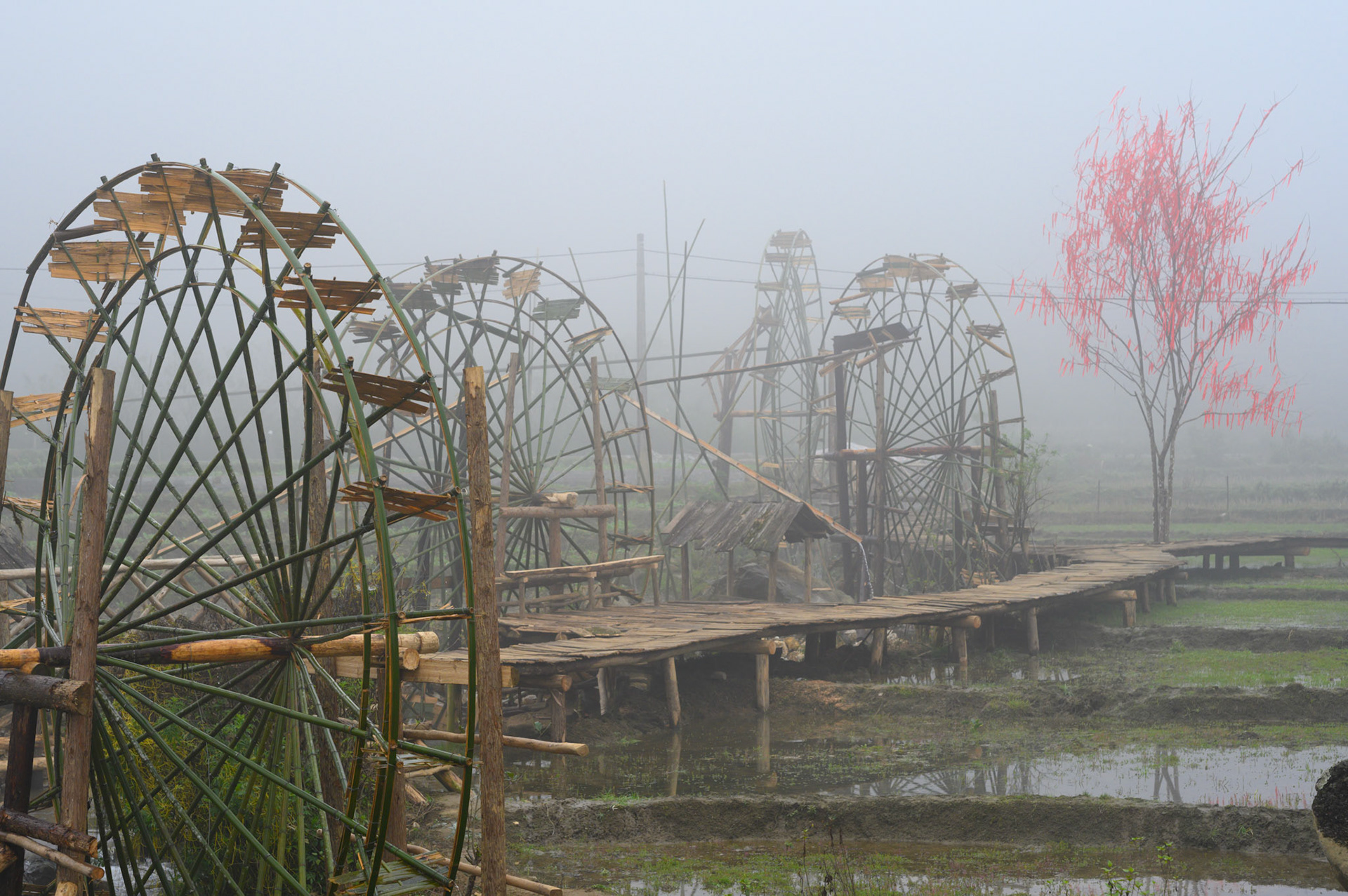 Cat Cat village showcases traditional agruculture and arts for tourists,. These water wheels were working anf lifting water.