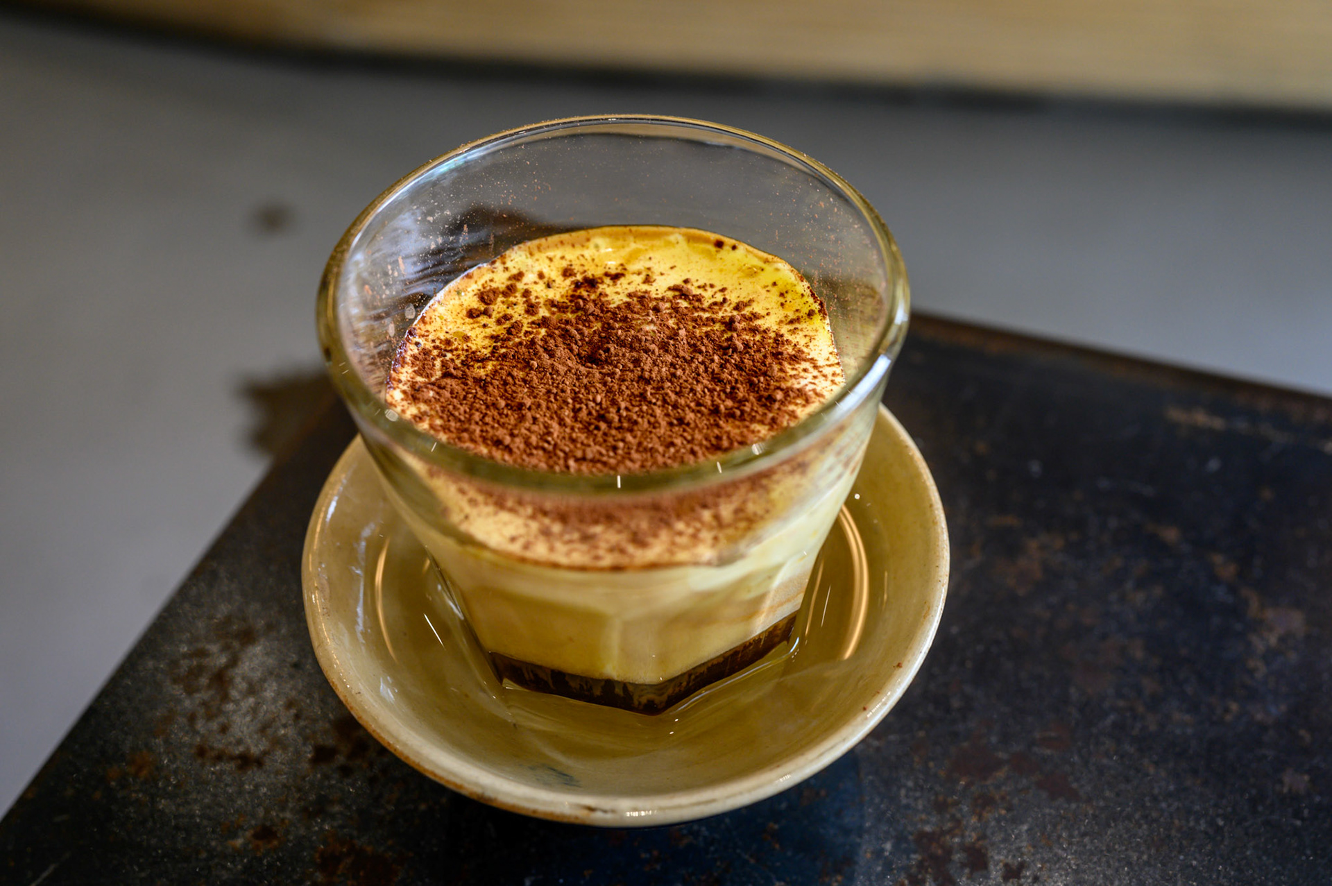 Egg coffee from Day Coffee, Saigon.
Egg coffee is a Saigon specialty, made from warmed beaten egg yolk, coffee, condensed milk, and topped with spices. It's a thick rich coffee meringue.