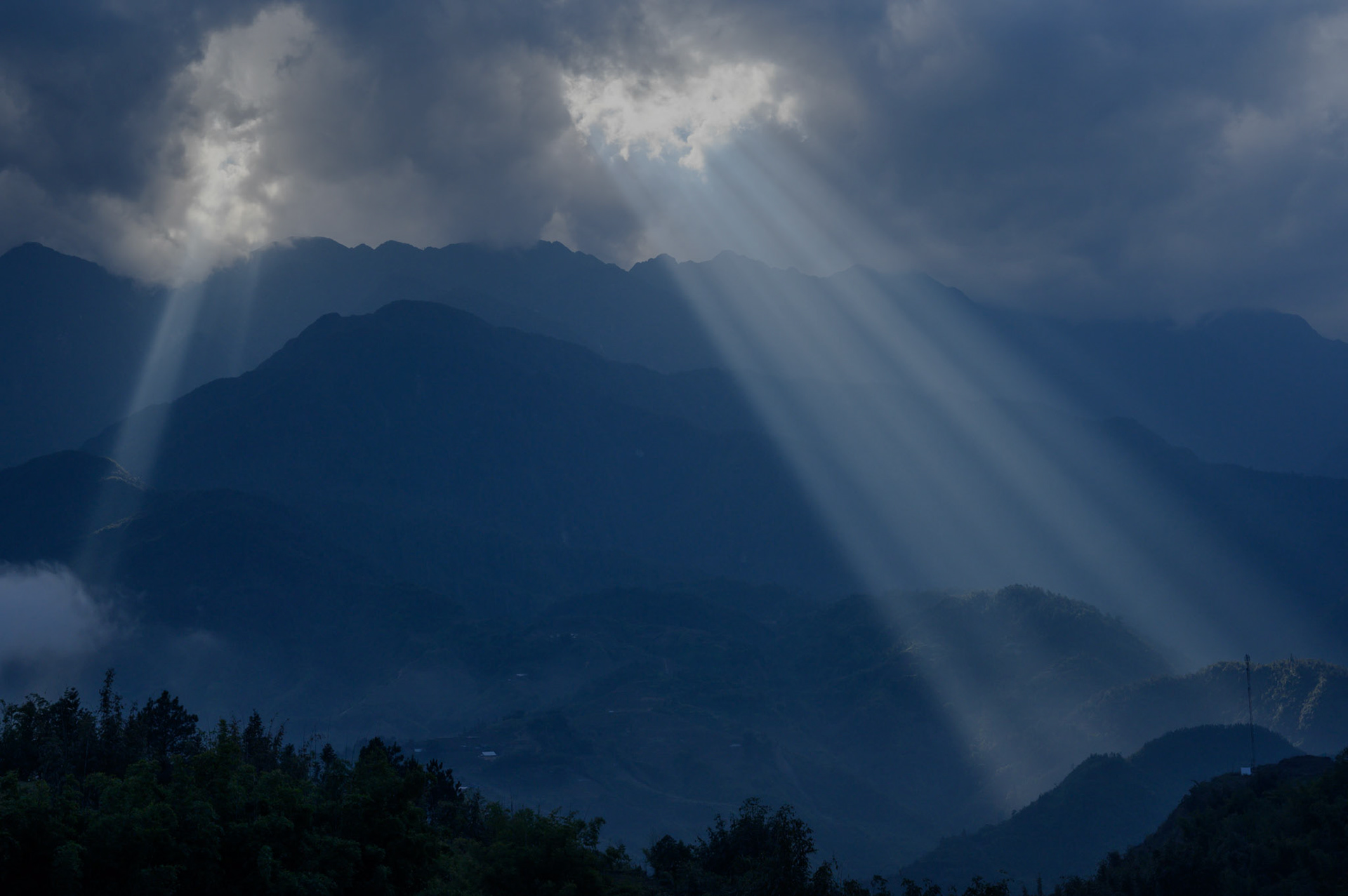 Sun rays pierce to the valley