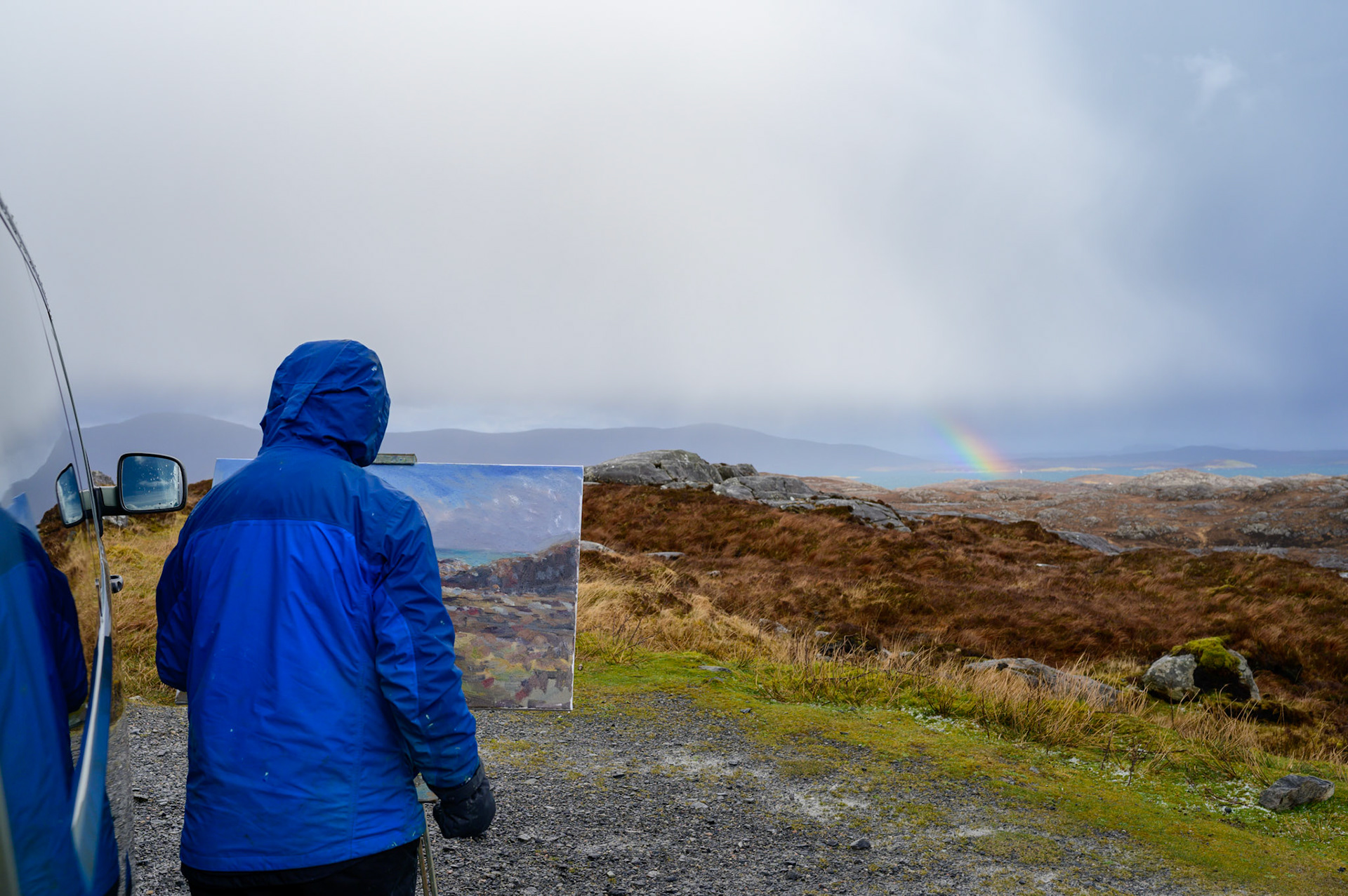 By the side of the road between Tarbet and Stornoway we found Tom. He was painting this loch between hail showers, protected from the wind by his van. 
Tom is from Lewis, Shouth England.