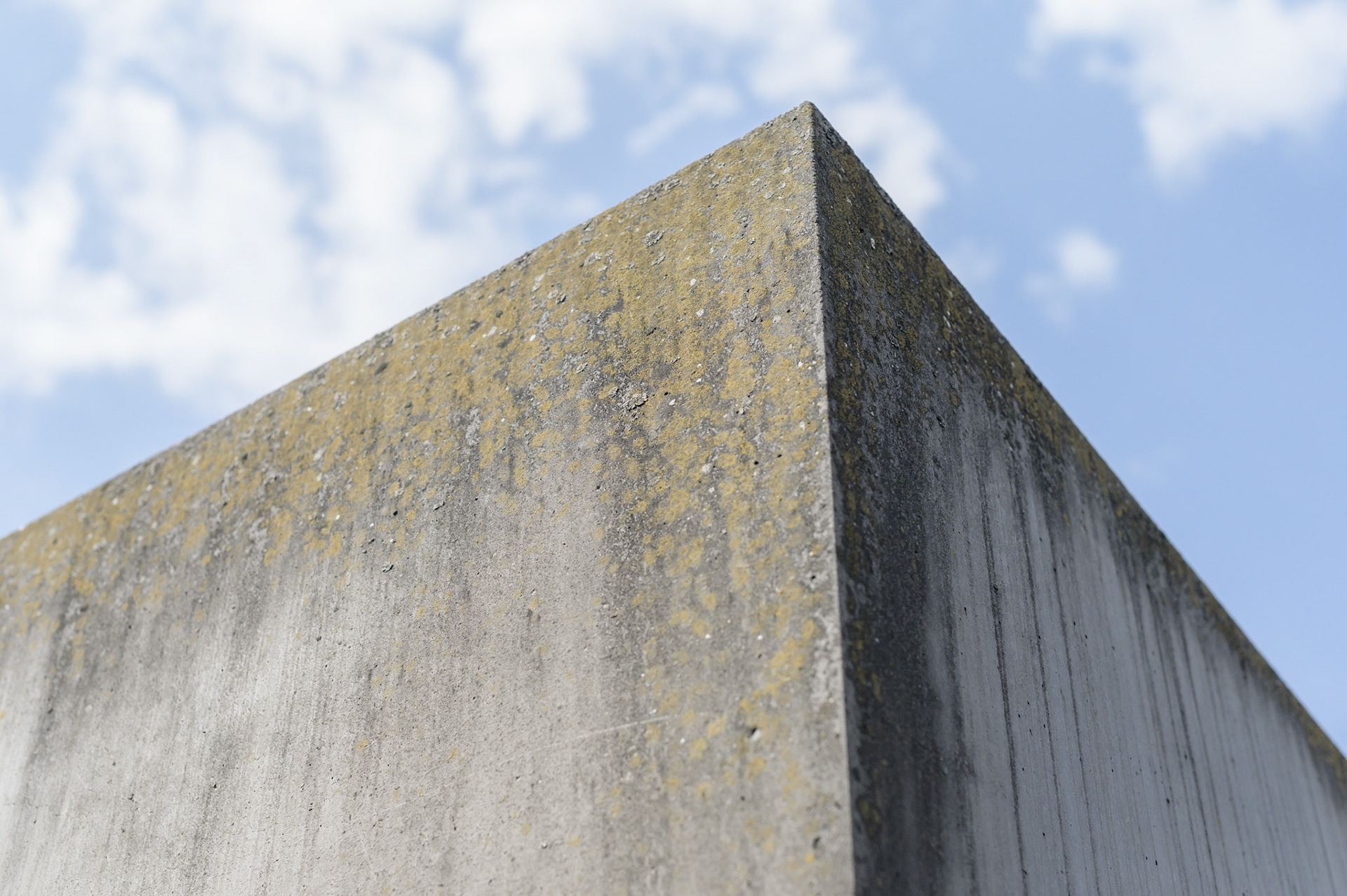 According to the designer, The Berlin Jewish Memorial  is not meant to signify anything. A person entering it is free to find their own meaning. For me, walking the canyons and looking over the expanse of grey blocks quickly brought a deeply contemplative slightly claustrophobic mood of insignificance into which the reason for the memorial could expand into consciouness.