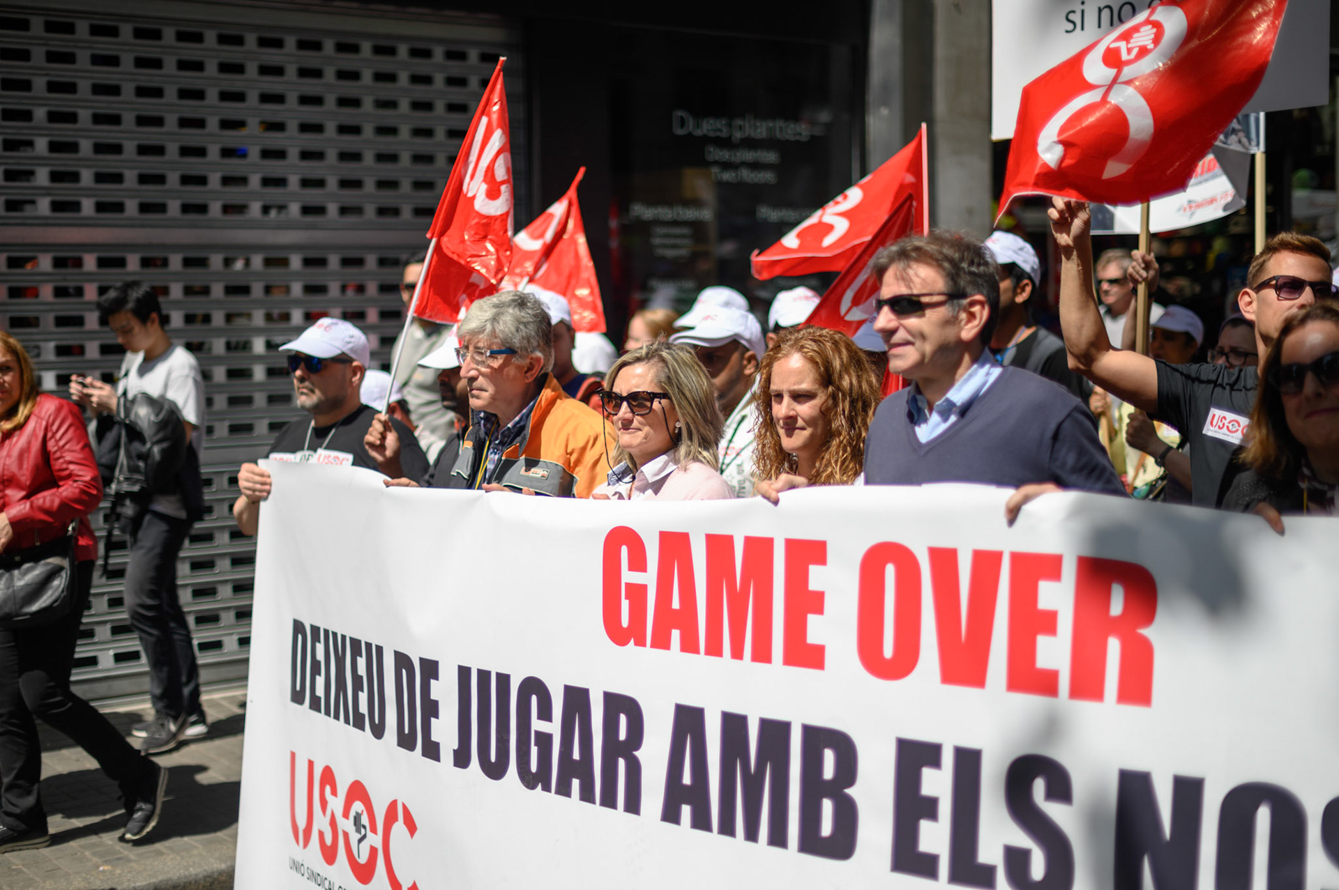 As is our unintentional habit we arrived in Barcelona for a public holiday. May Day.
I was excited on seeing a poster for a CNT rally to experience good old-school anarchist fire-and-brimstone. On our way to the CNT rally we happened across the USOC march. lead by the Taboo drum troupe. Lost of good energy noise and socially relavant banners as they wound their way through Barcelona.
We did make it to the CNT rally eventually. Very tame with a couple of anarchist book stalls, other merchandise, and what sounded like very dull speeches. Go USOC!