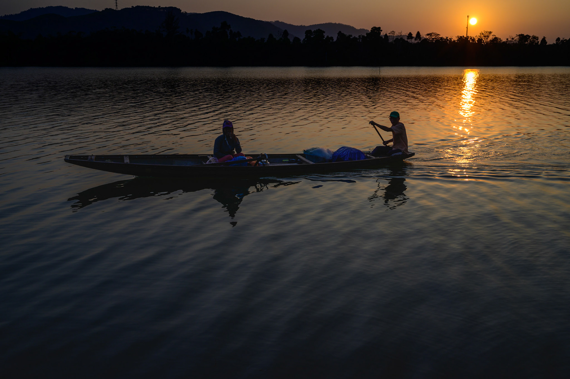 Watching the sunset over the Perfume River