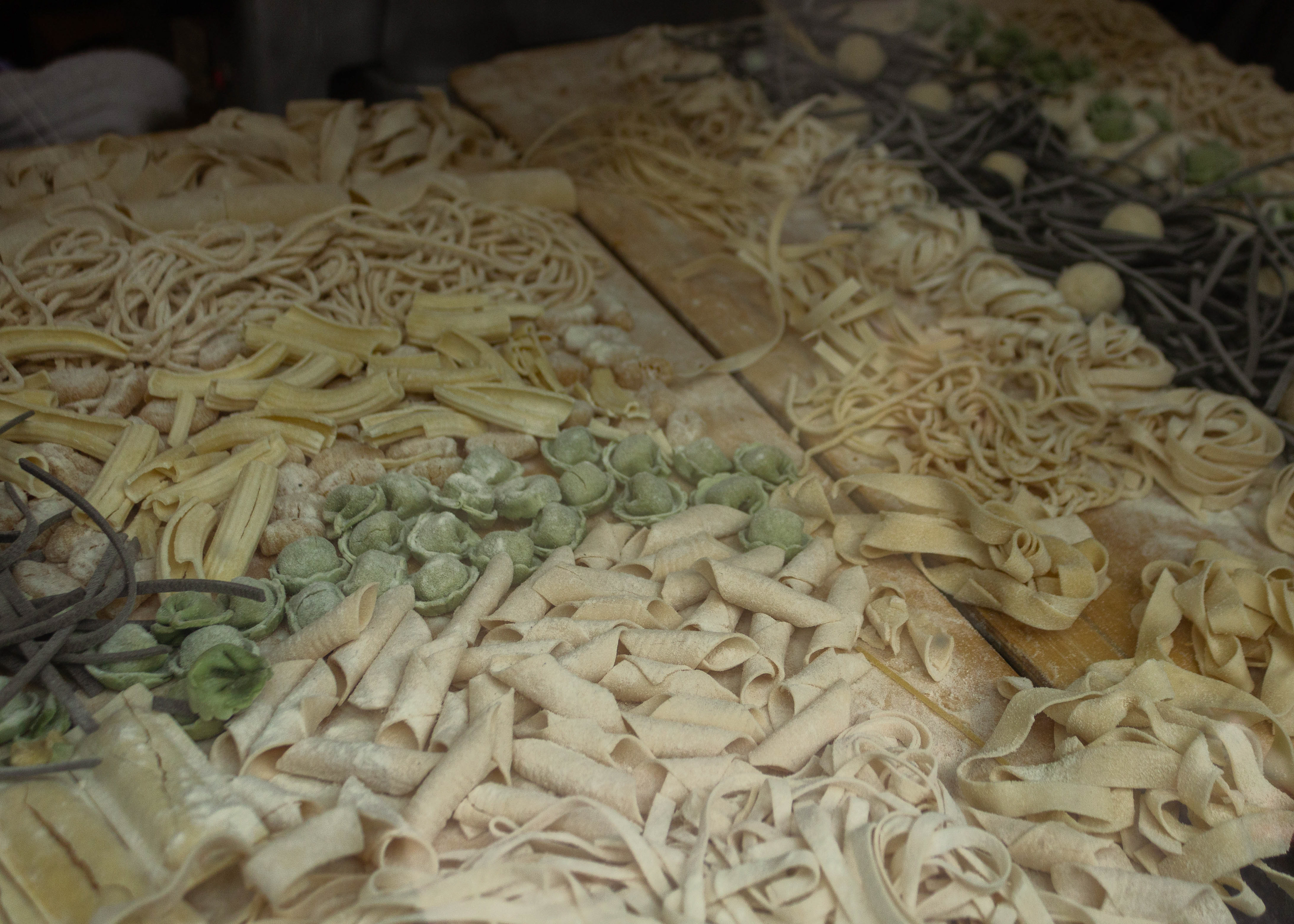 Fresh handmade pasta in the window of a North End shop window.