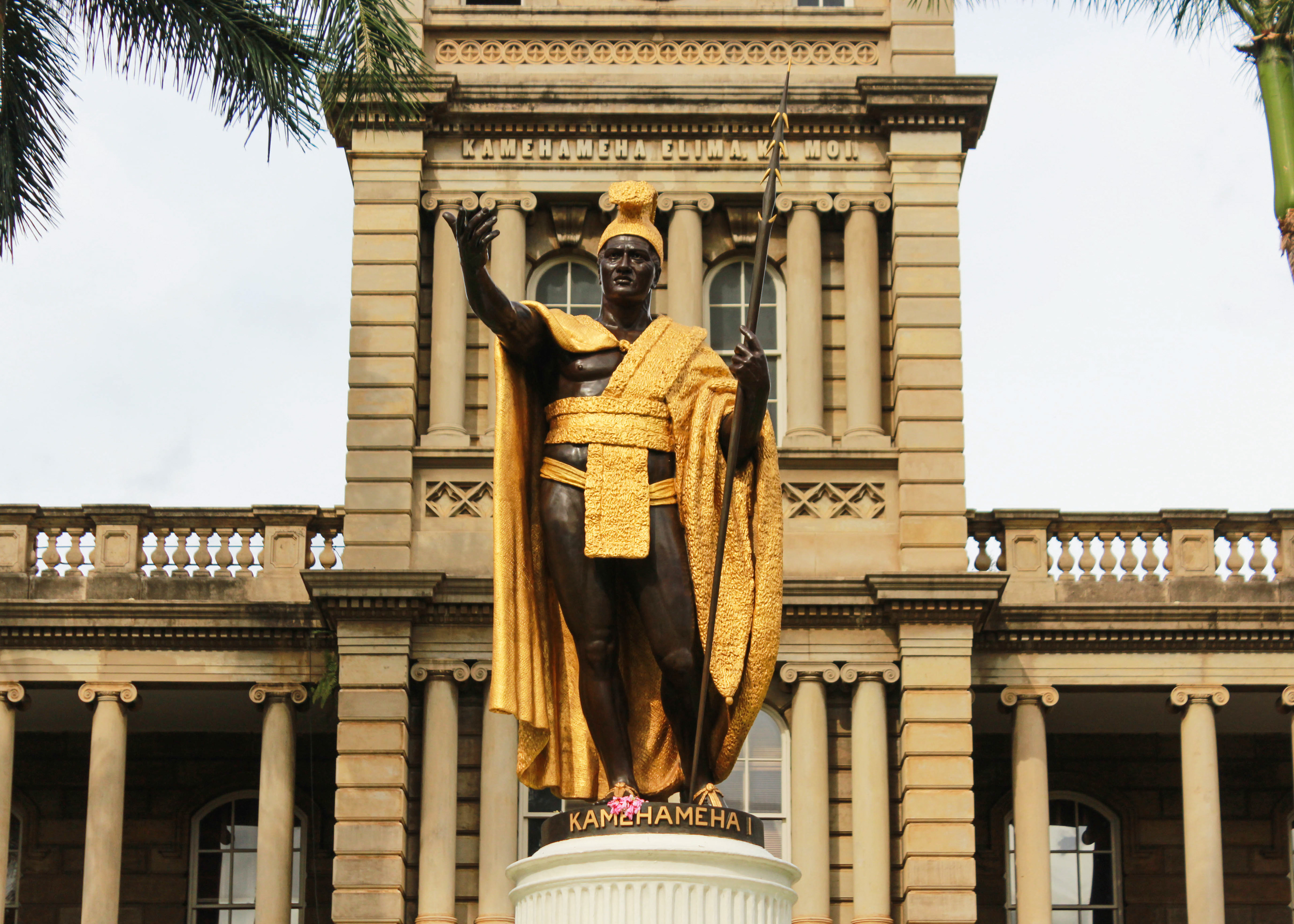 The original statue of King Kamehameha stands in front of Ali'iolani Hale.