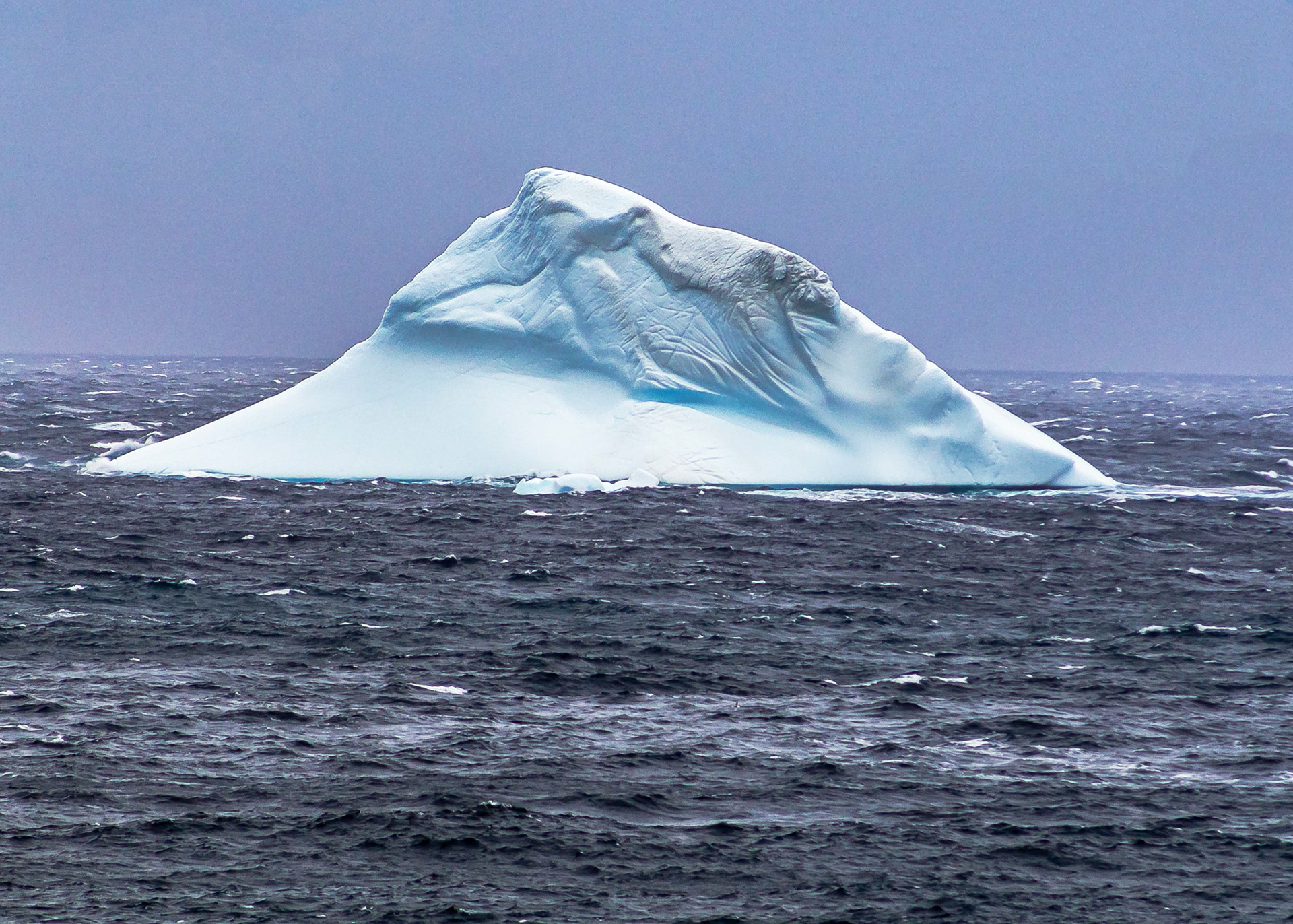 Deteriorating Iceberg With Surface Debris