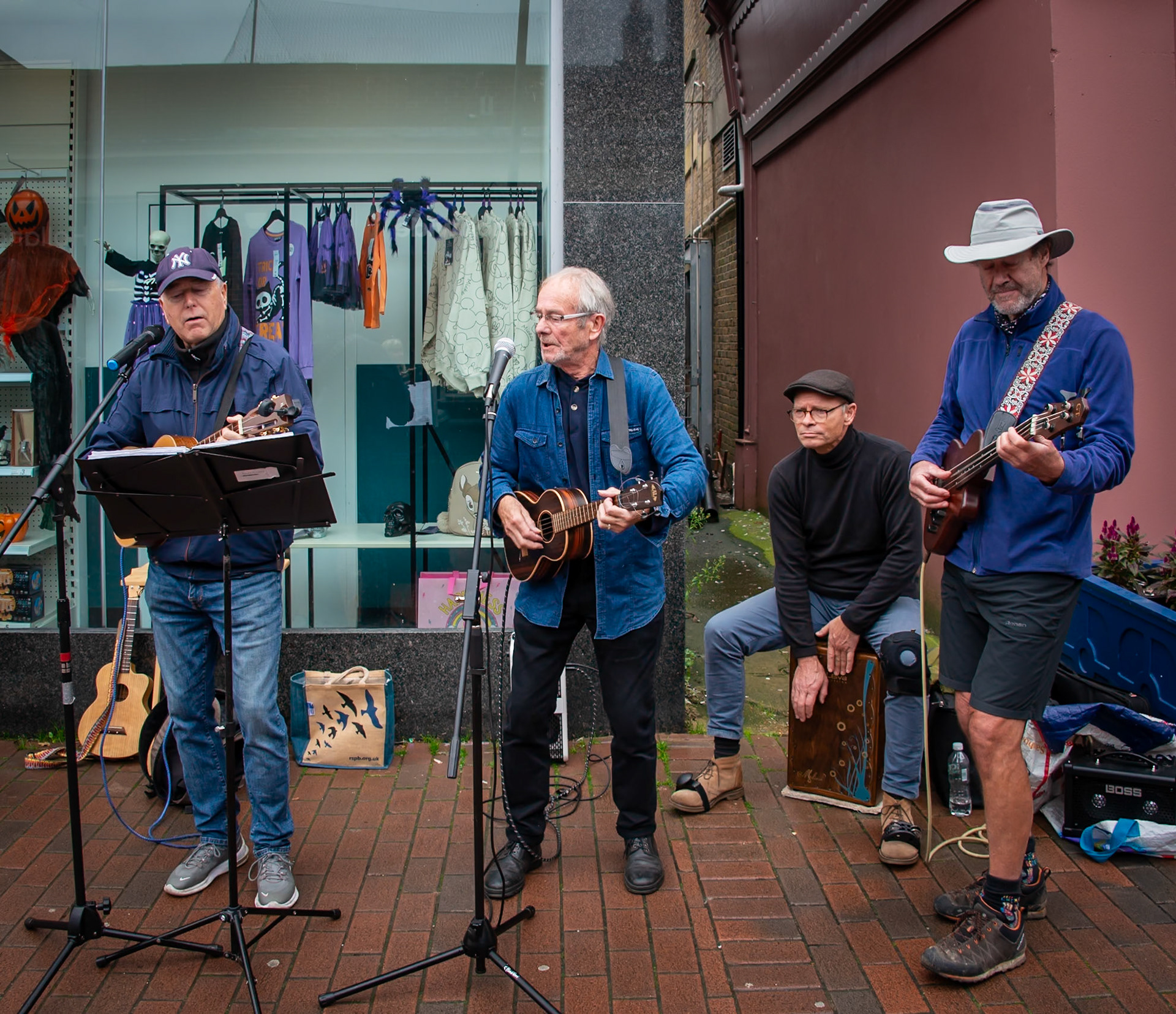 The Rollers, busking in the High Street for Macmillan Cancer Support, 26th October, 2024.