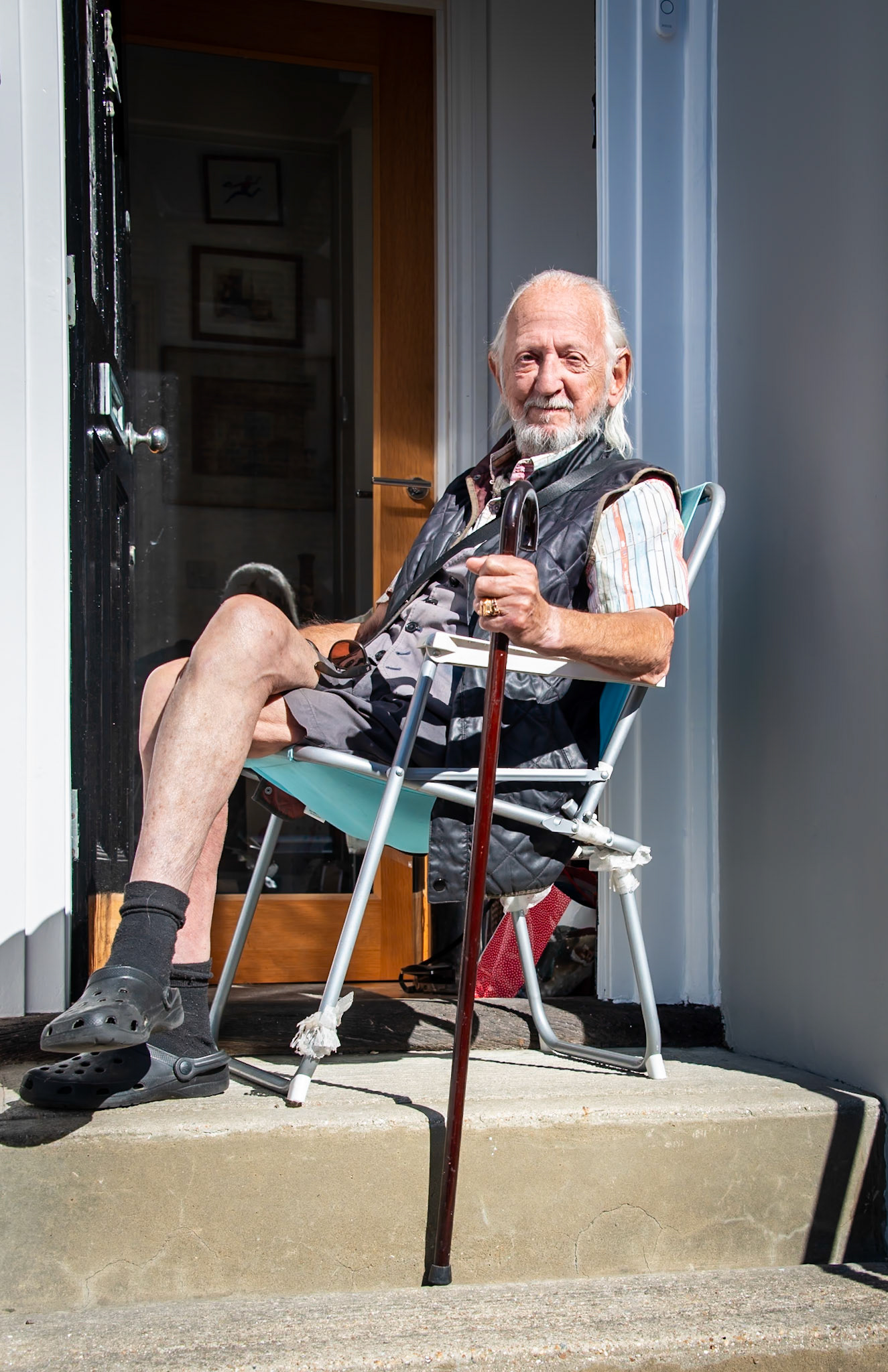 Dr Stuart Hopps OBE, a film, opera and theatre choreographer, director, teacher and educator, who I spotted enjoying the morning sun outside his front door, 28th September, 2024. Stuart choreographed the English National Opera, Welsh National Opera and Scottish Opera and over 20 feature films, including The Wicker Man. He chaired and sat on numerous national committees and boards concerned with dance and the arts. In 2008 Stuart received an Honorary Doctorate of Arts from City University for services to choreography. He told me some great stories about working with leading directors  and famous actors including Kenneth Branagh and Britt Ekland. A lovely, affable and distinguished gentleman who was happy to describe himself as a Denizen of Deal. www.denizensofdeal.com
