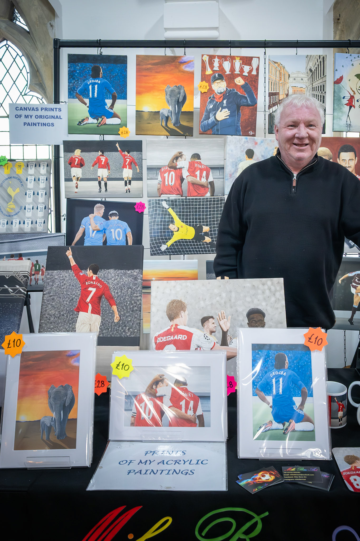 Mike Beer with prints of his wonderful paintings of footballers. Craft Fair at the Landmark Centre. 14th Feb.