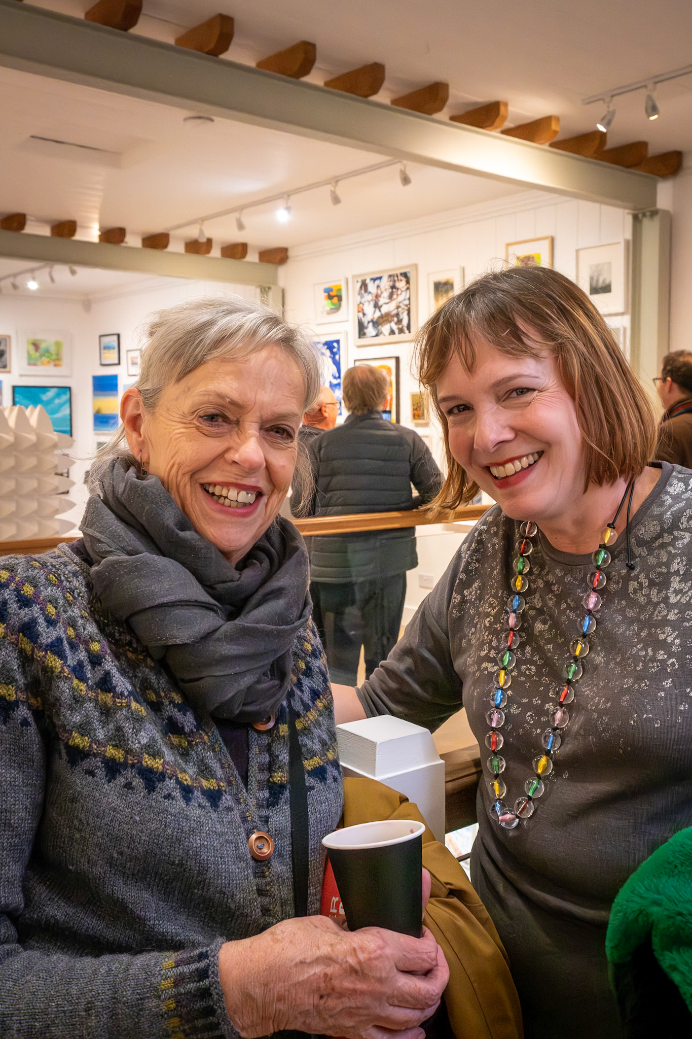 Prue Cross, an artist, and Victoria Longhurst, a Harpist, at the Private Viewing and Launch of the Winter Group Show 2025-26 at the Linden Hall Studio. 