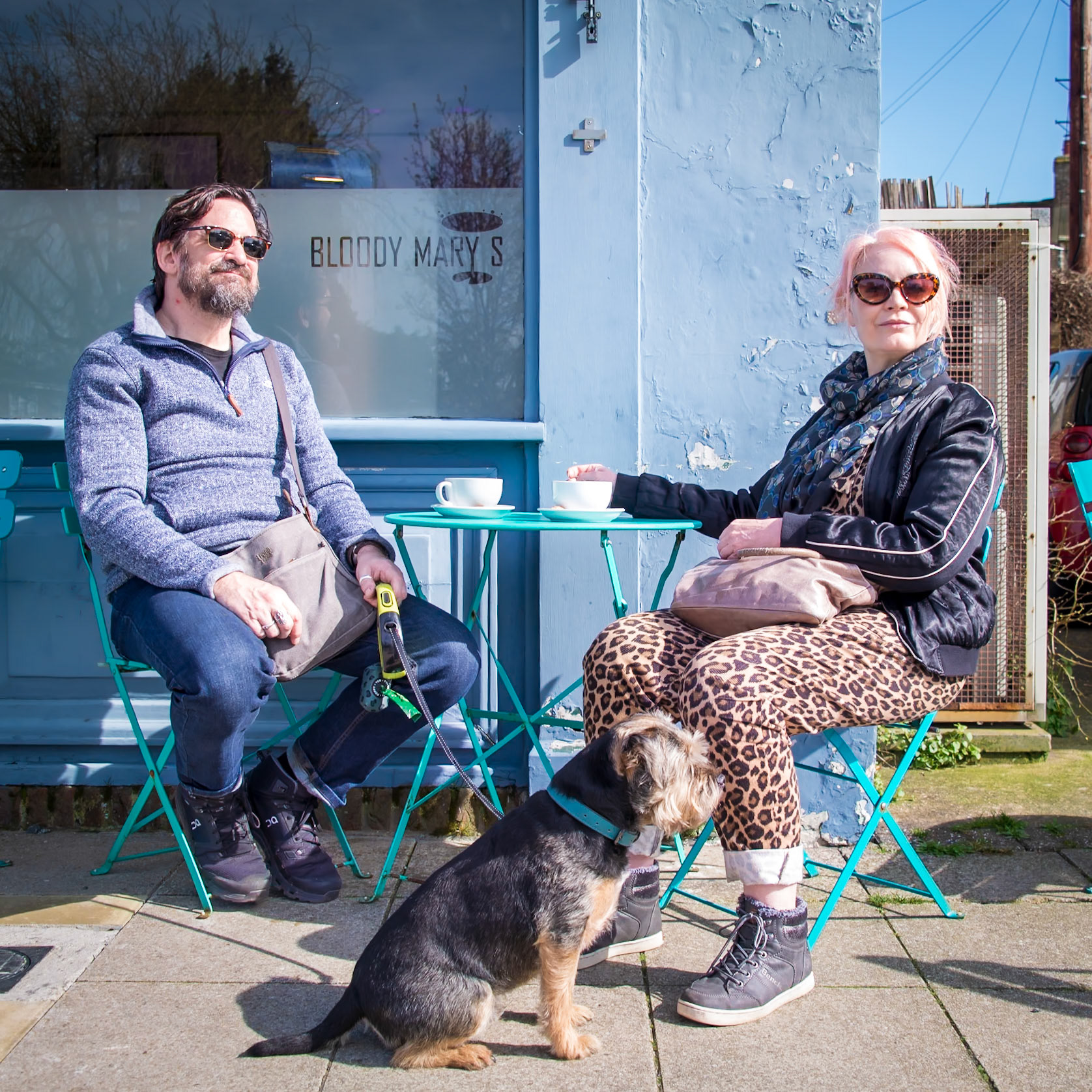 Gary and Sally outside Bloody Mary's, Deal High Street, 16th March, 2024. Gary is a Video Effects (VFX) Artist. Sally is a macro photographer. Huxley, the dog, is not interested in photography.