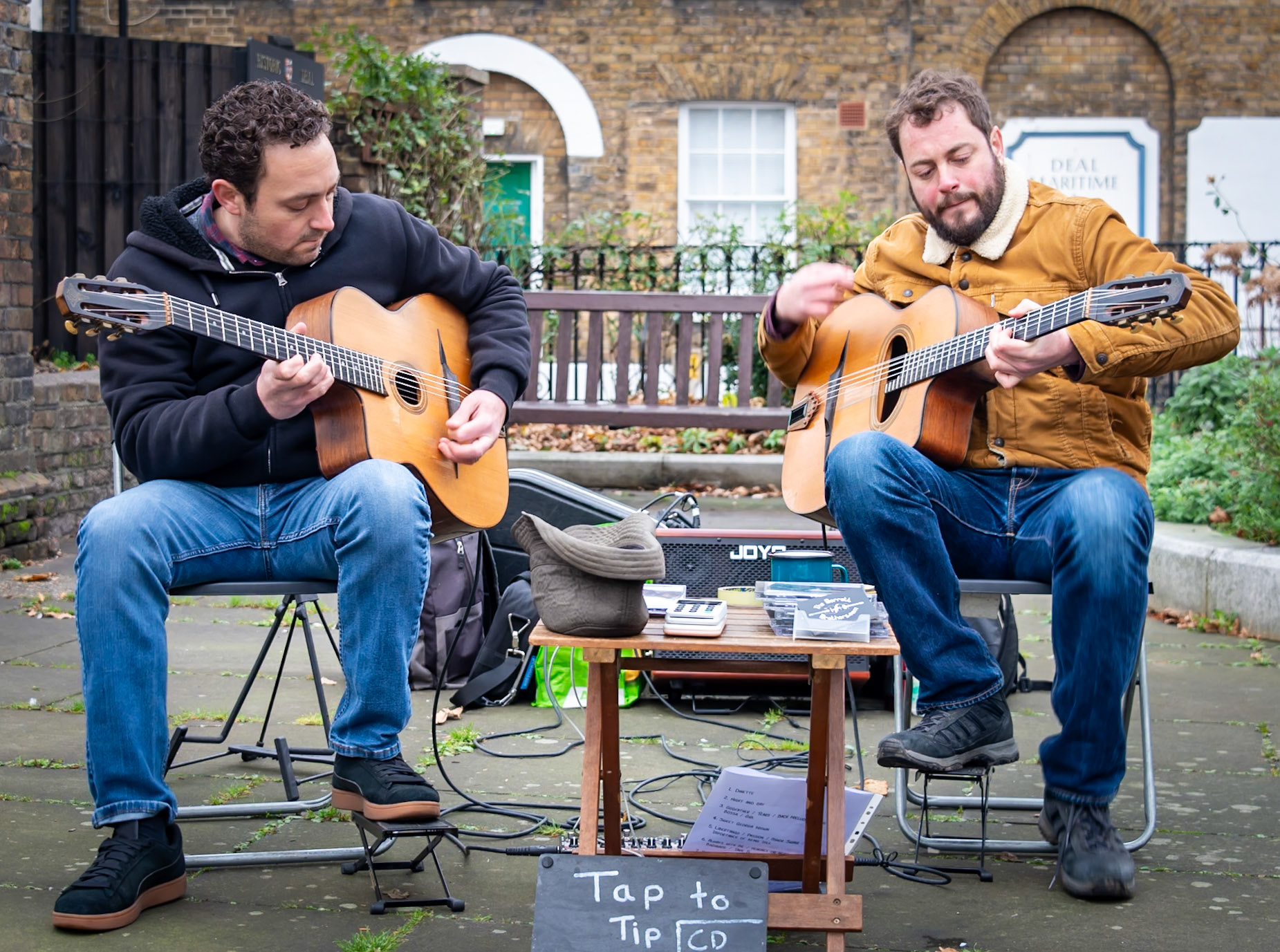 The Barrett Brothers, a very talented Gypsy Jazz Guitar Duo, playing outside St Georges Church, 30th November 2024.