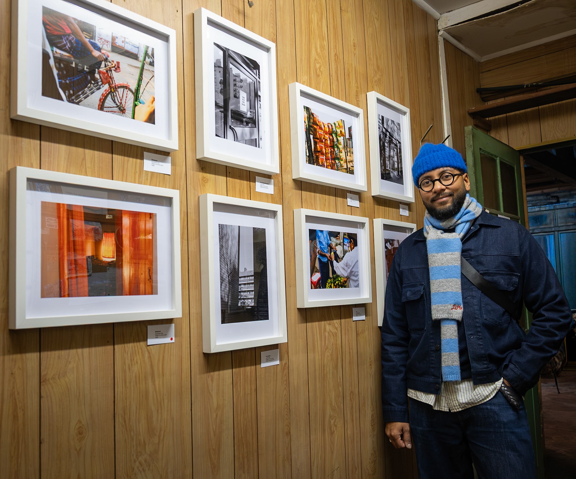 Monwar Hussain, a deal photographer, exhibiting at the Bygga Bo Hygge Pop Up Party. Green Garage, Station Road, Walmer, 4th December, 2025. 