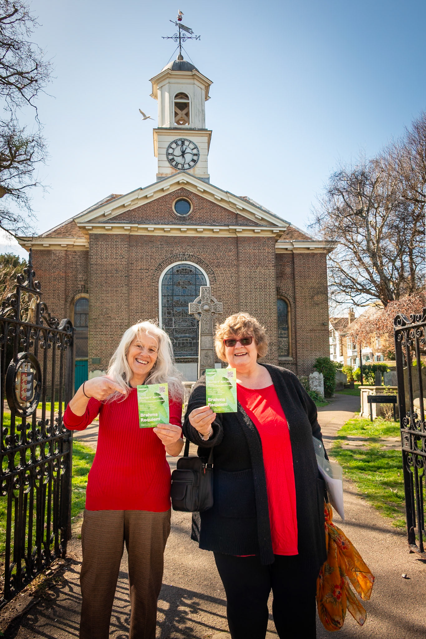 Mandy and Dianna, members of Deal and Walmer Handelian Society, advertising a performance of the Brahms Requiem at St Georges Church next Saturday, 5th April, 2025.