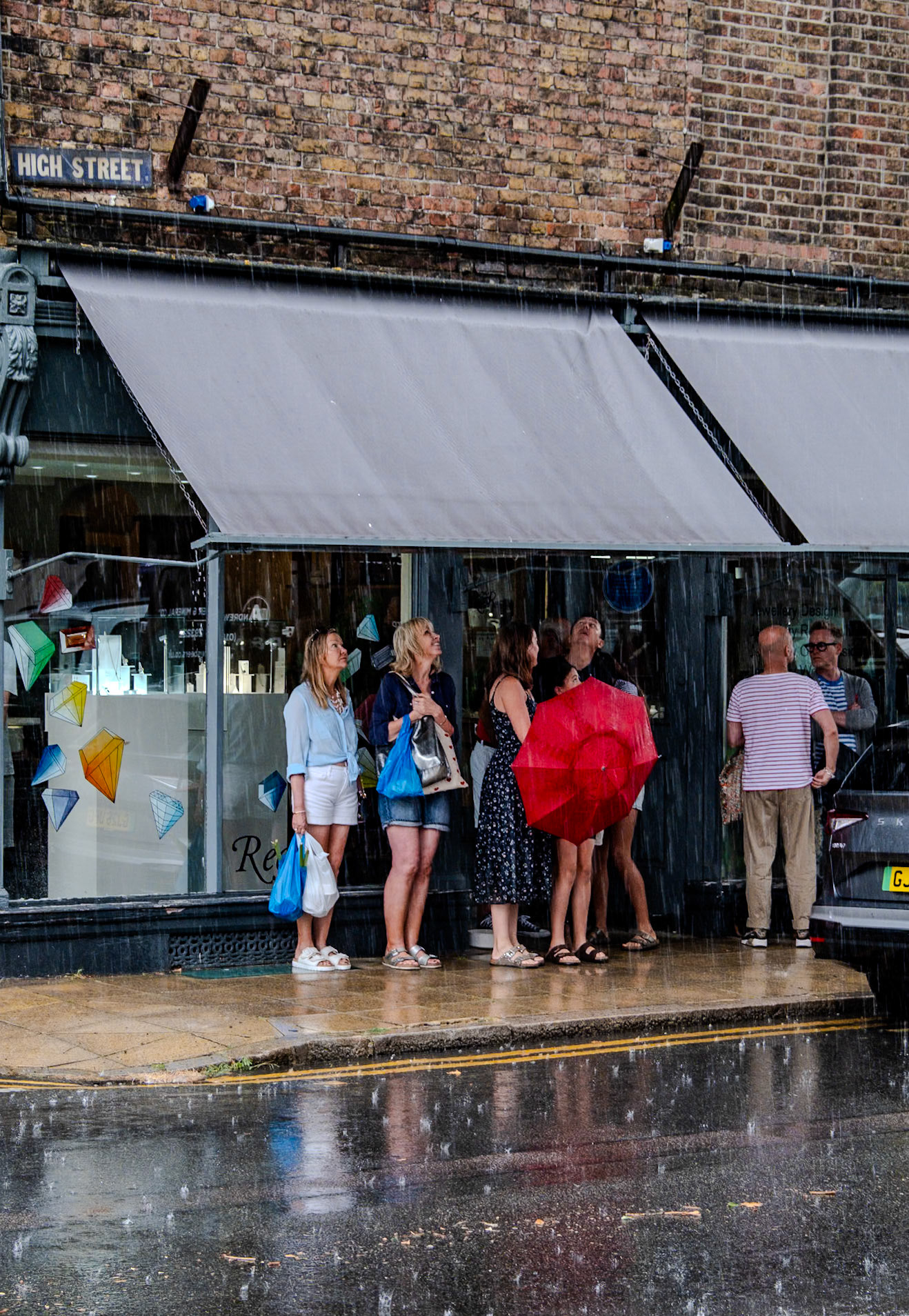 After many weeks of hot, dry weather, rain arrived for an hour or so on Market Day. Saturday, 1st August, 2026.