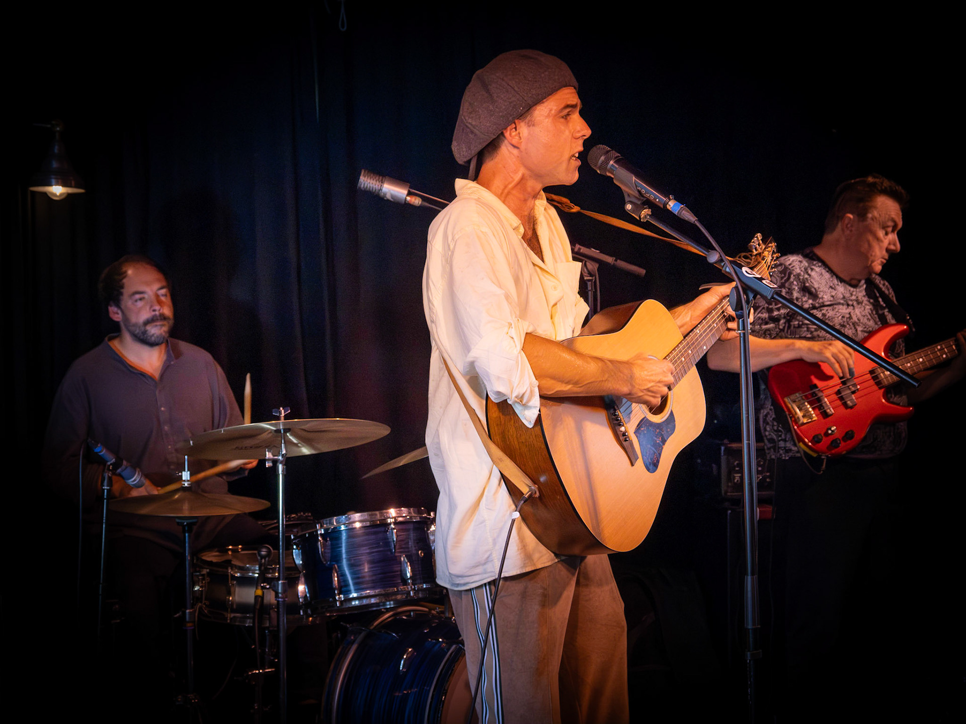 Blues trio at The Lighthouse Music and Arts Pub, The Strand, Walmer Green, this evening 27th August, 2023. Callum Sutton on vocals, guitar & blues harp; Kevin Dore on bass; and drums from The Lighthouse’s very own James Hatton!