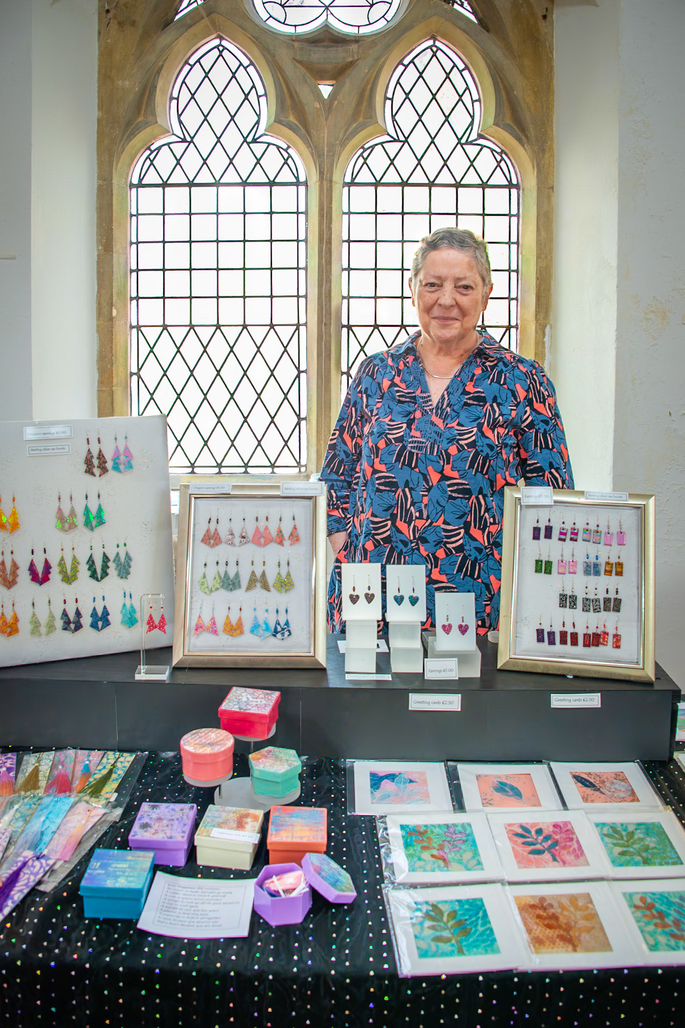 Kate who makes lovely origami artworks and jewellery. Craft Fair for the Leaps and Bounds Community Project, The Landmark Centre, 12th April, 2025. The project promotes independence and provides skills for adults with learning disabilities.