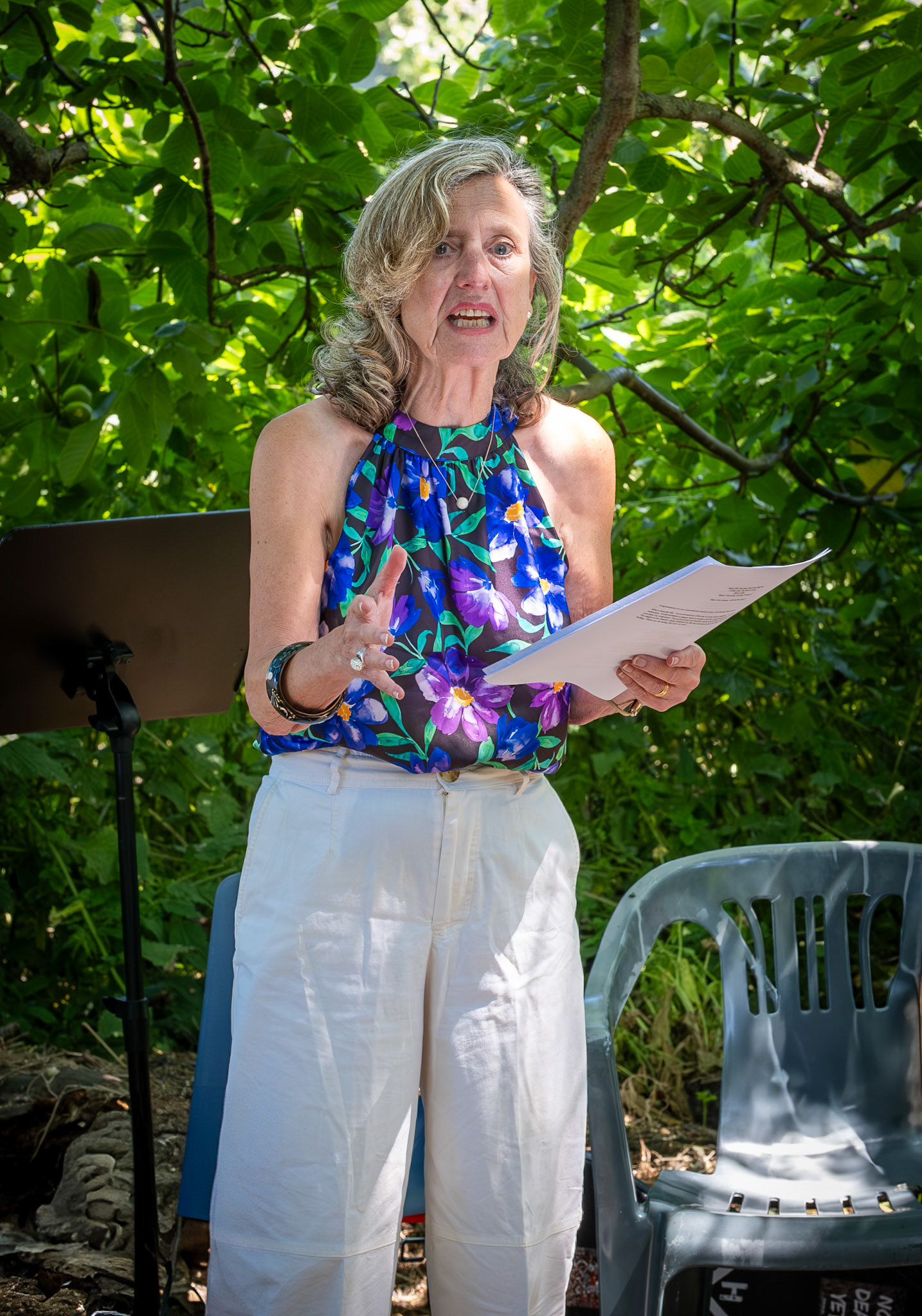 Natalie Cameron-Ward, actor and poet, reading her poem about Barbie, found dead and naked on the railway tracks at Deal Station. Was it the wicked Ken wot done it? Poetry readings at the Captains Garden Open Day
